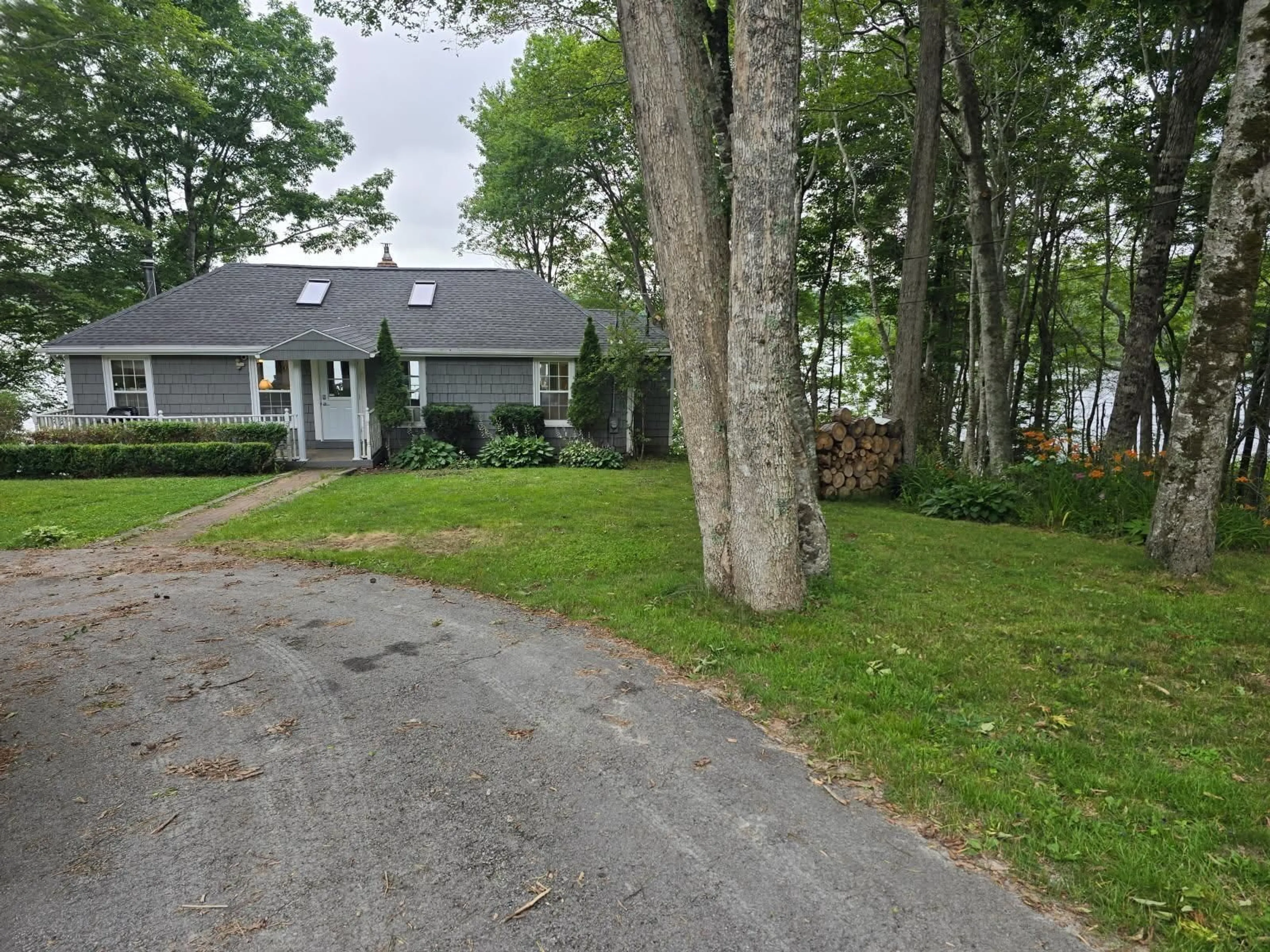 A pic from outside/outdoor area/front of a property/back of a property/a pic from drone, street for 253 Perry Rd, Carleton Nova Scotia B5A 5R2