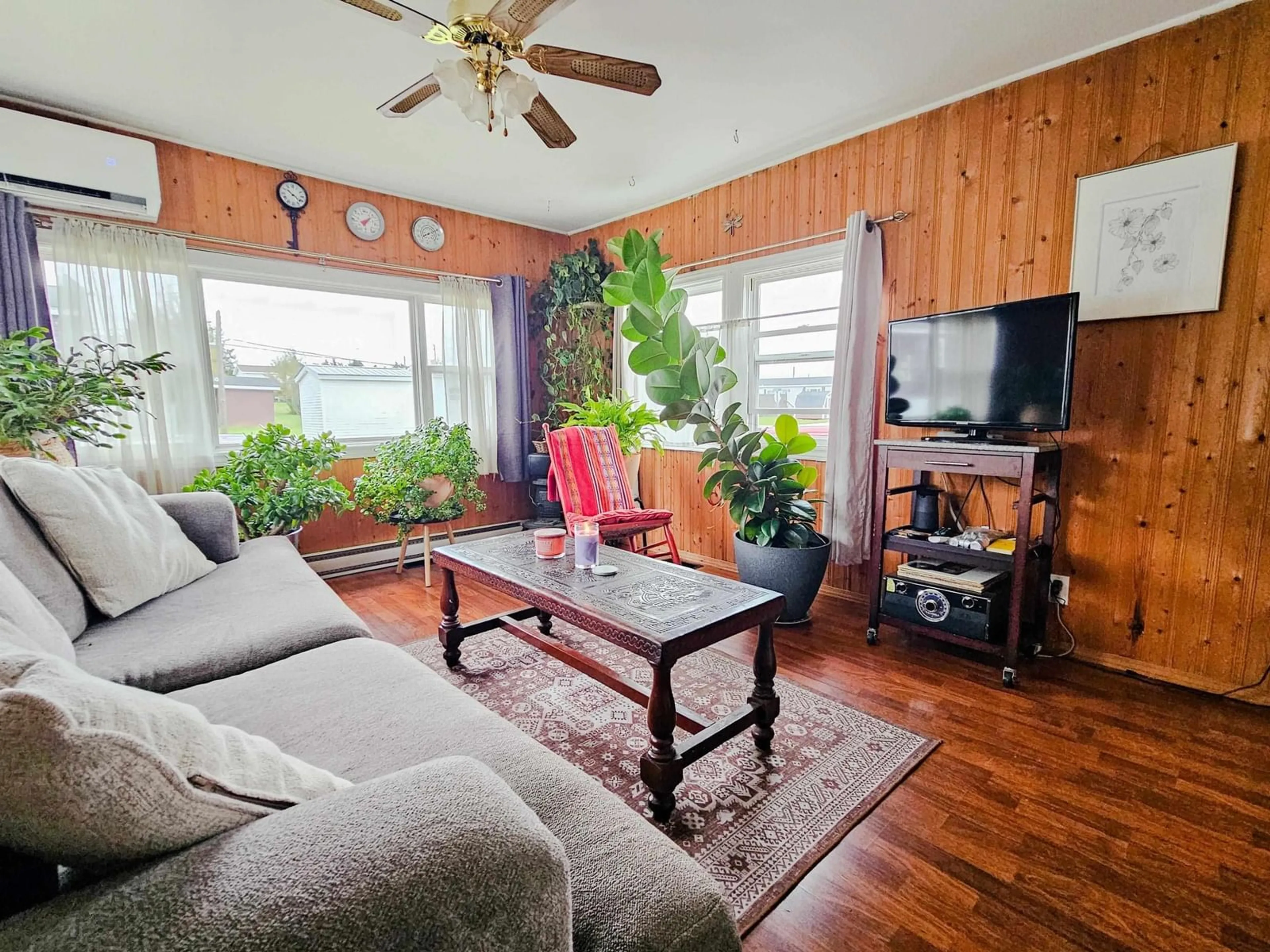 Living room with furniture, wood/laminate floor for 5 Bomber Dr, Bible Hill Nova Scotia B2N 2W5
