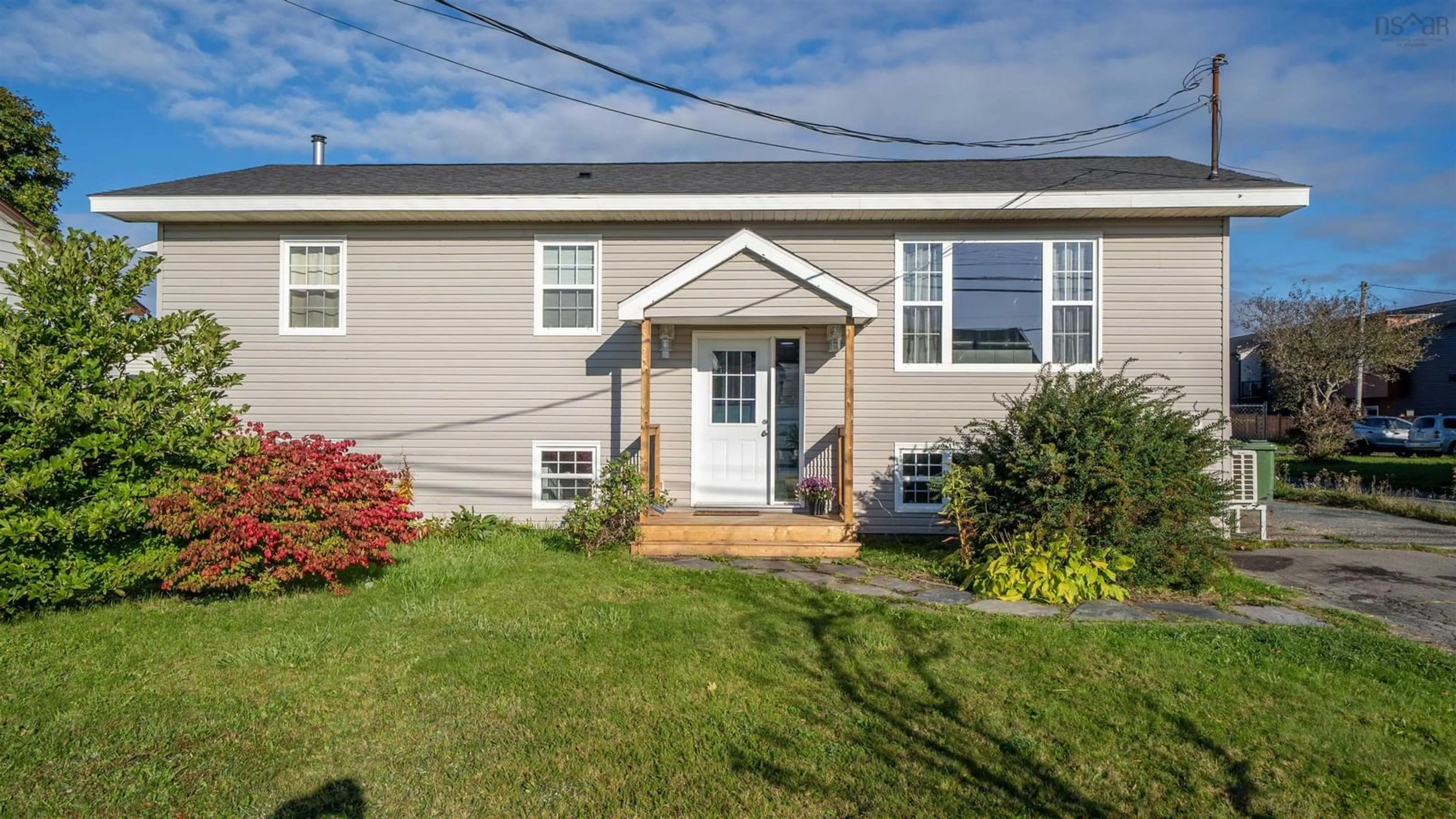 Home with vinyl exterior material, street for 380 Cow Bay Rd, Eastern Passage Nova Scotia B3G 1J4