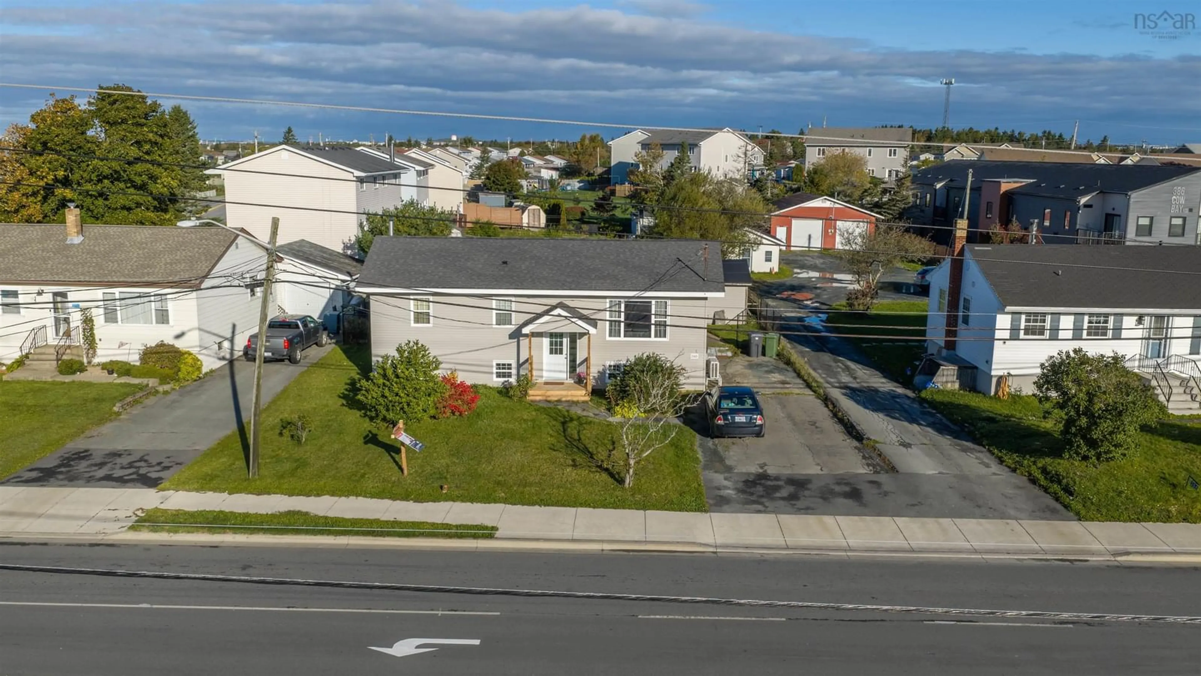 A pic from outside/outdoor area/front of a property/back of a property/a pic from drone, street for 380 Cow Bay Rd, Eastern Passage Nova Scotia B3G 1J4