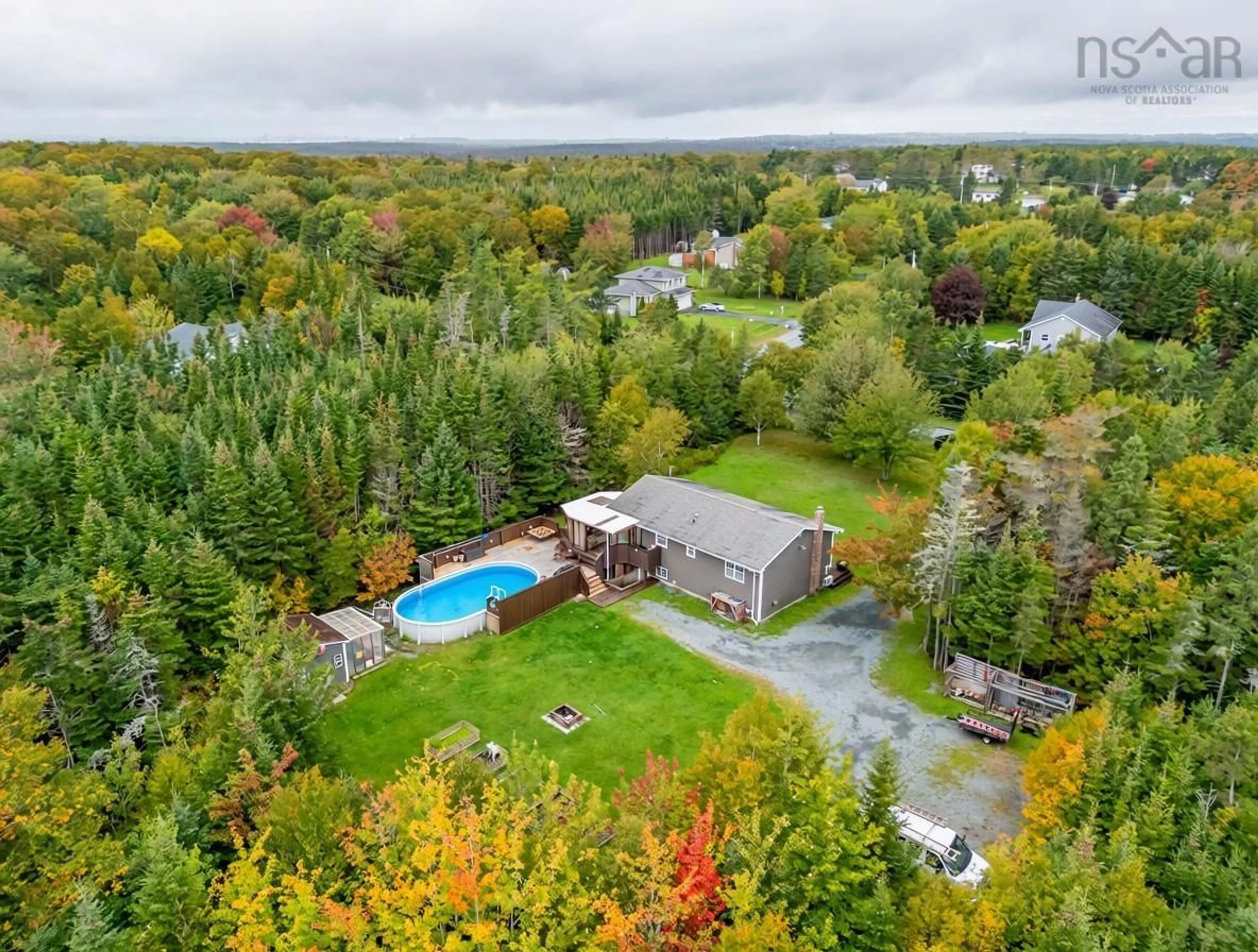 A pic from outside/outdoor area/front of a property/back of a property/a pic from drone, water/lake/river/ocean view for 20 Flandrum Hills Rd, Cow Bay Nova Scotia B3G 1K3