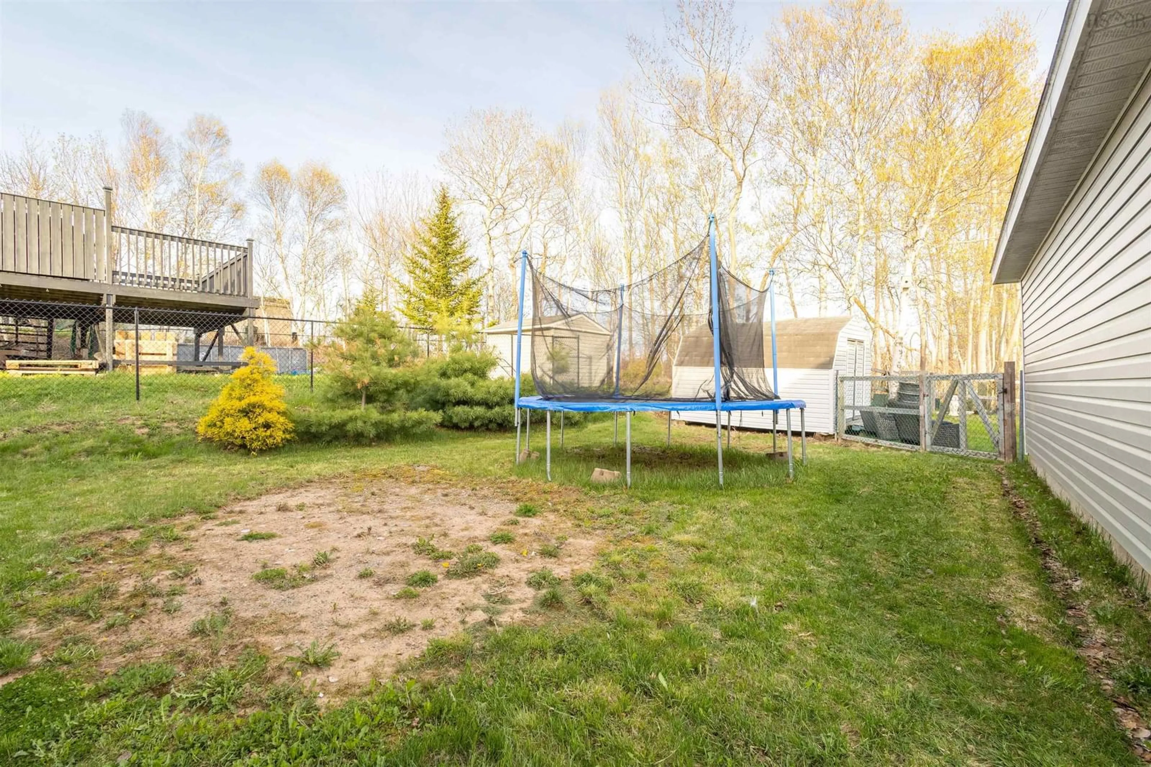 Patio, forest/trees view for 25 Macdonald Cres, Sydney Mines Nova Scotia B1H 3H5