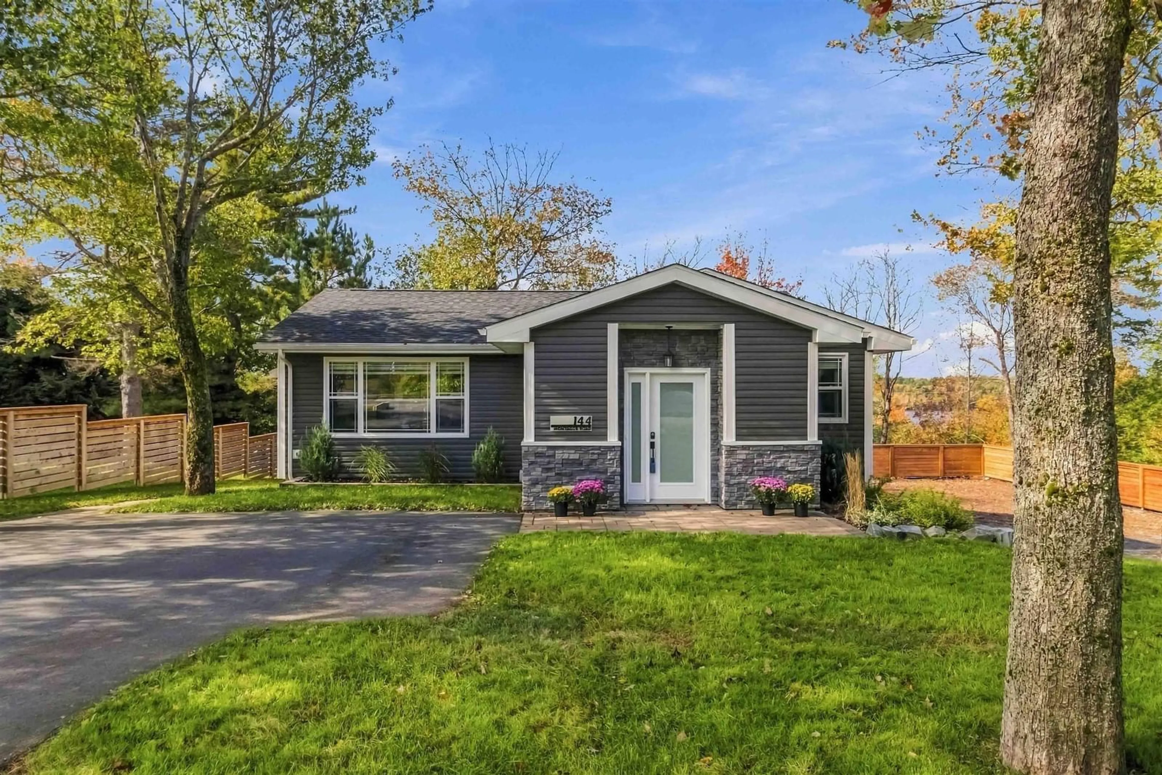 Home with vinyl exterior material, street for 144 Montague Rd, Lake Loon Nova Scotia B2W 3P3