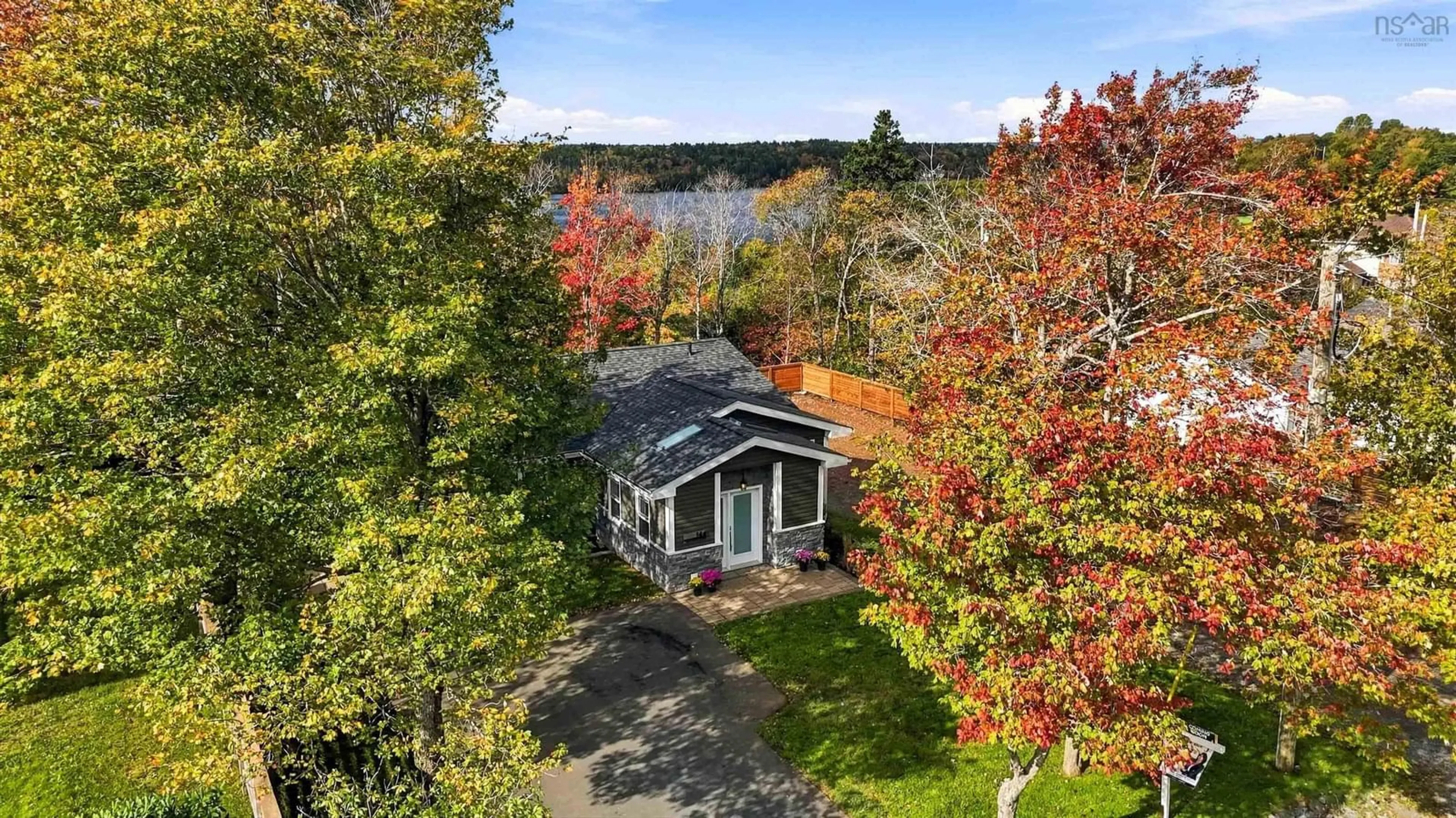 A pic from outside/outdoor area/front of a property/back of a property/a pic from drone, water/lake/river/ocean view for 144 Montague Rd, Lake Loon Nova Scotia B2W 3P3