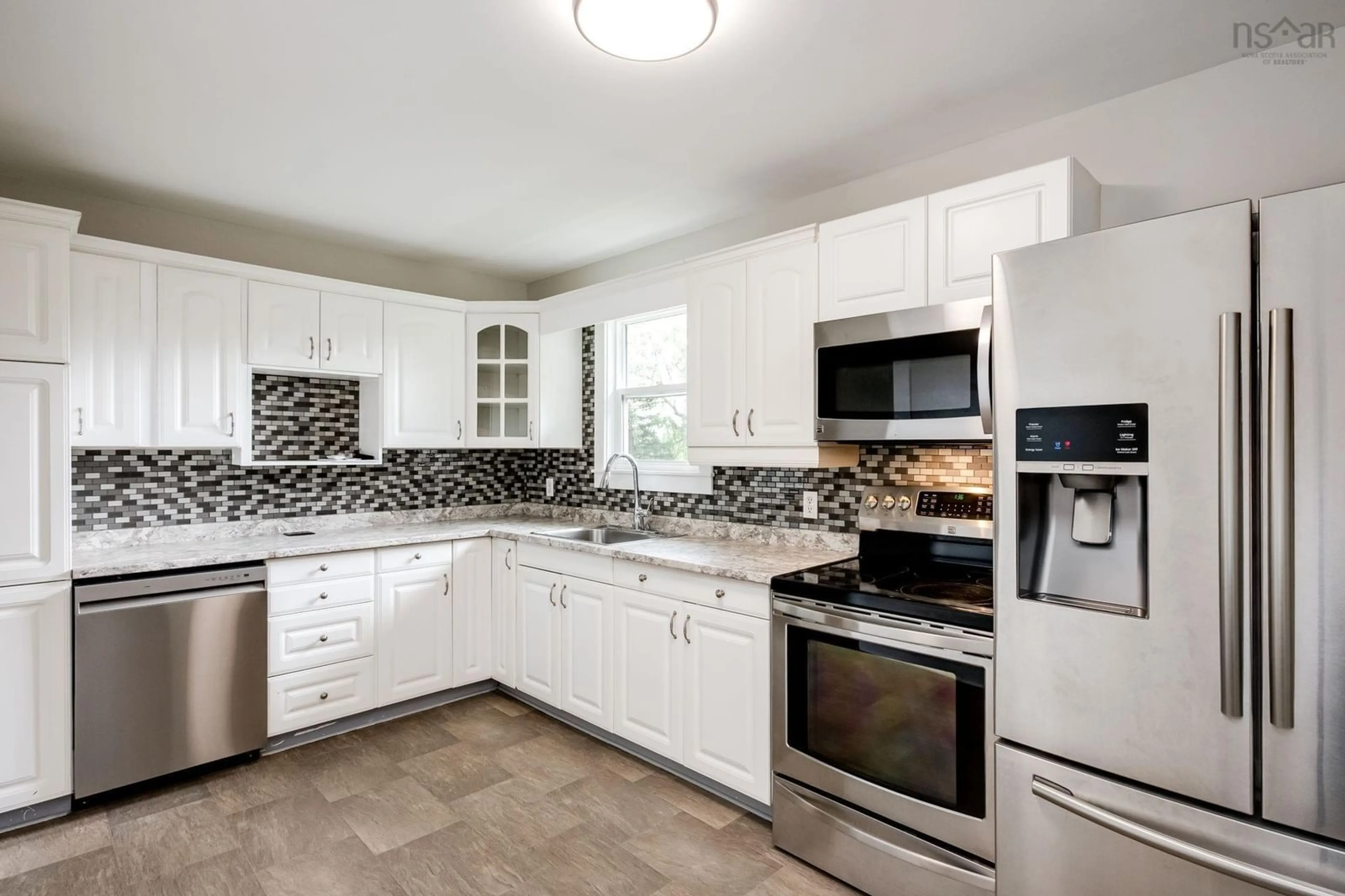 Open concept kitchen, ceramic/tile floor for 10068 Highway 221, Habitant Nova Scotia B0P 1H0