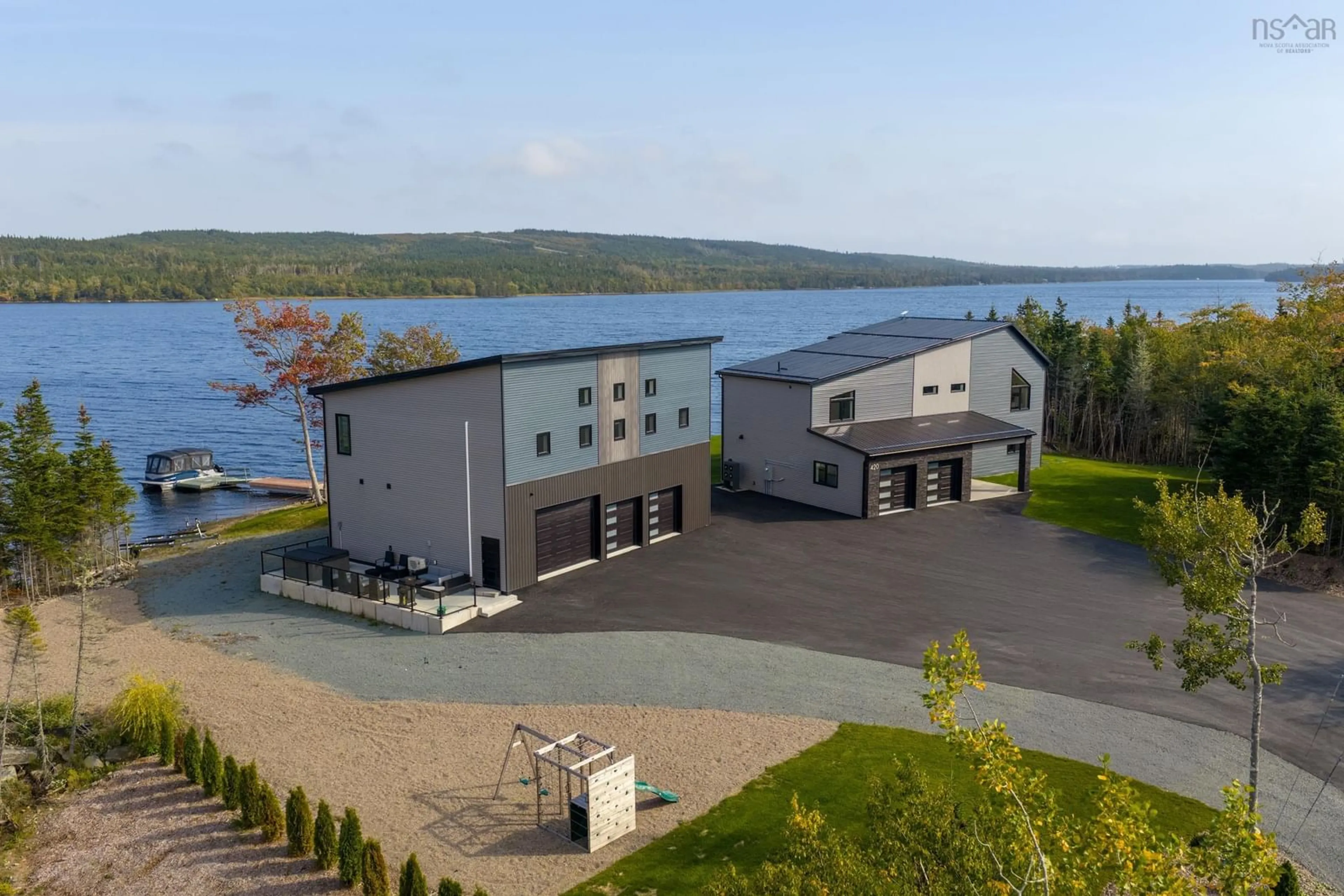 A pic from outside/outdoor area/front of a property/back of a property/a pic from drone, water/lake/river/ocean view for 420 Greyowl Dr, Middle Porters Lake Nova Scotia B3E 0B6