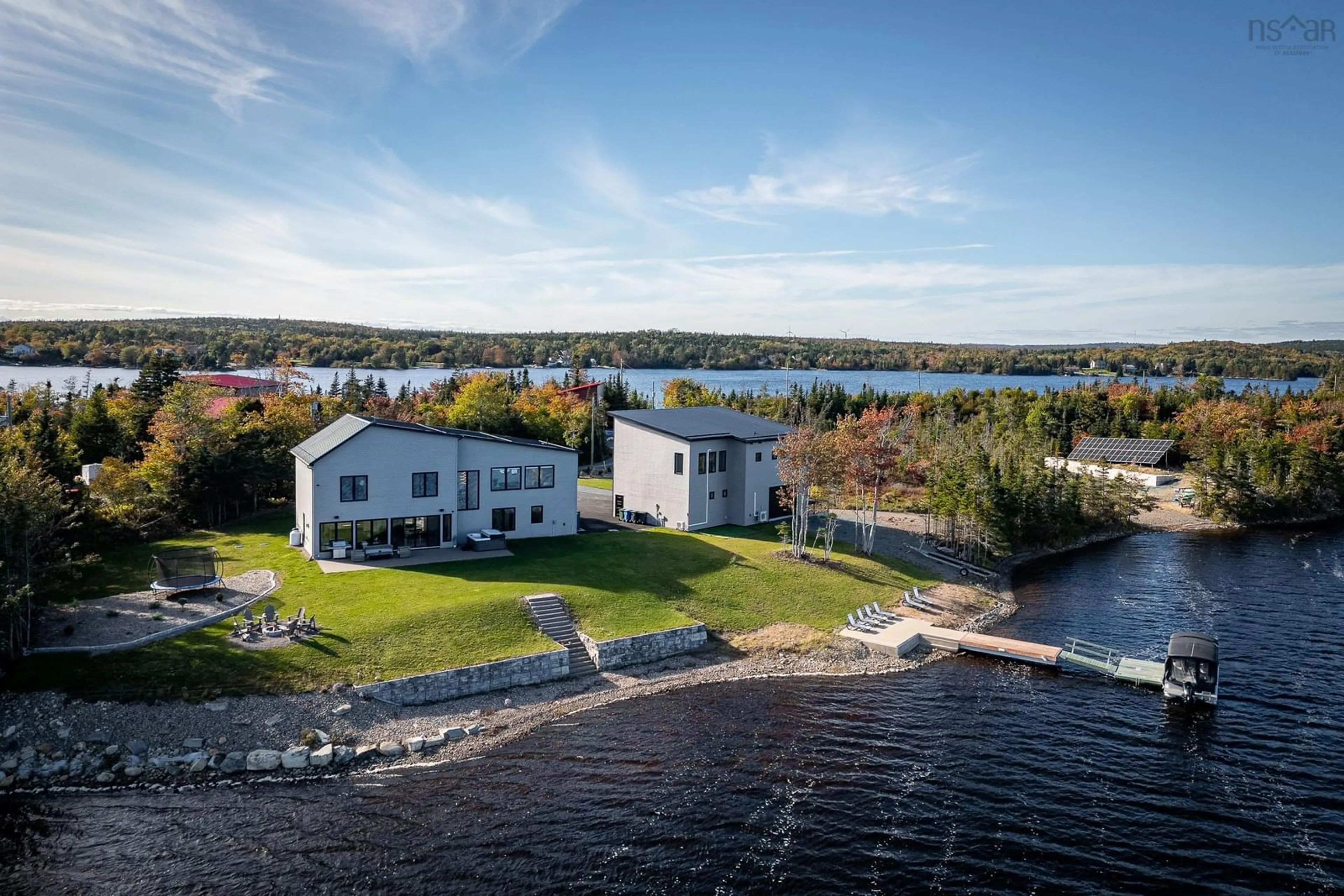 A pic from outside/outdoor area/front of a property/back of a property/a pic from drone, water/lake/river/ocean view for 420 Greyowl Dr, Middle Porters Lake Nova Scotia B3E 0B6