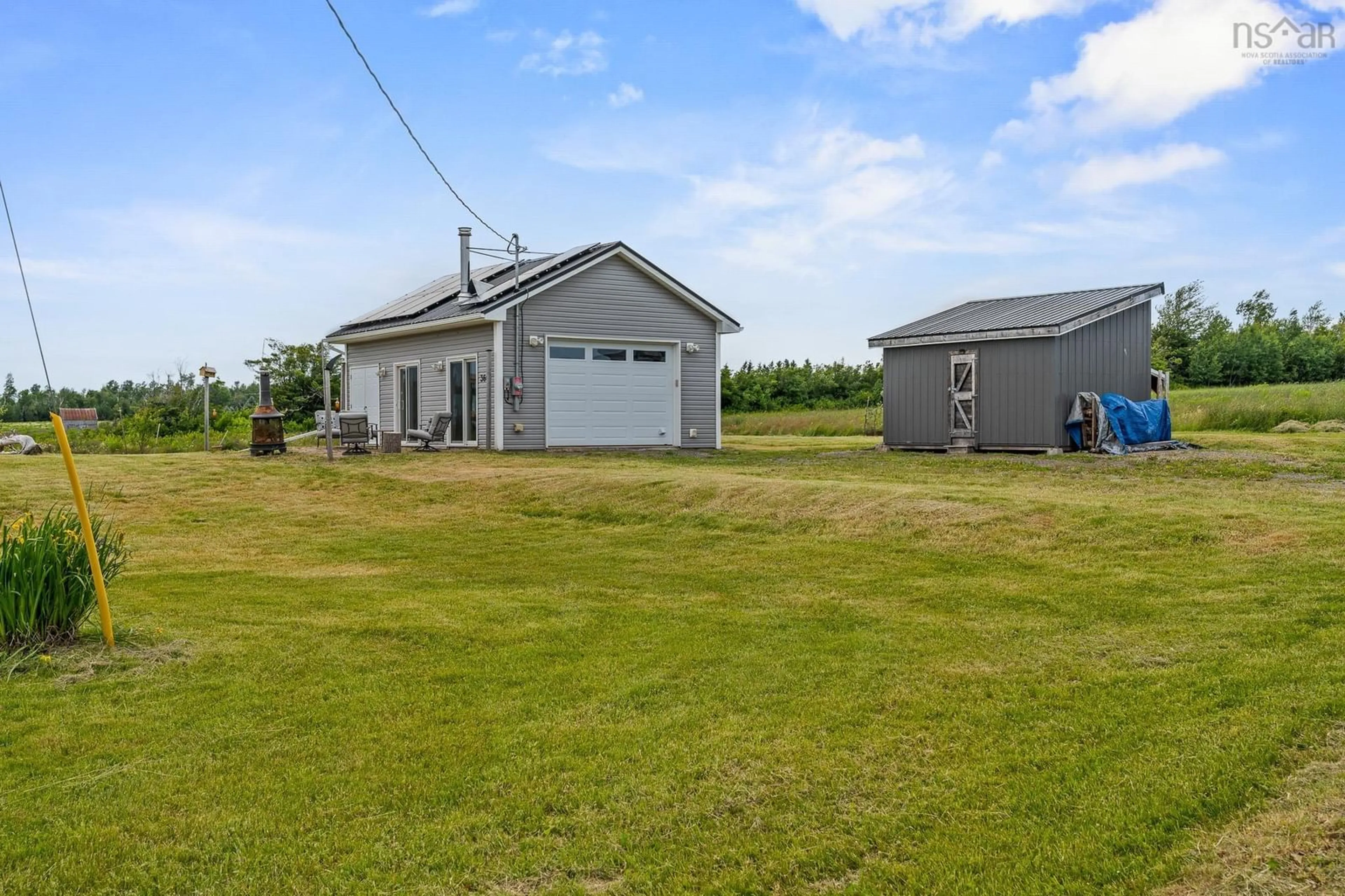 A pic from outside/outdoor area/front of a property/back of a property/a pic from drone, unknown for 3667 Malagash Rd, Malagash Centre Nova Scotia B0K 1E0