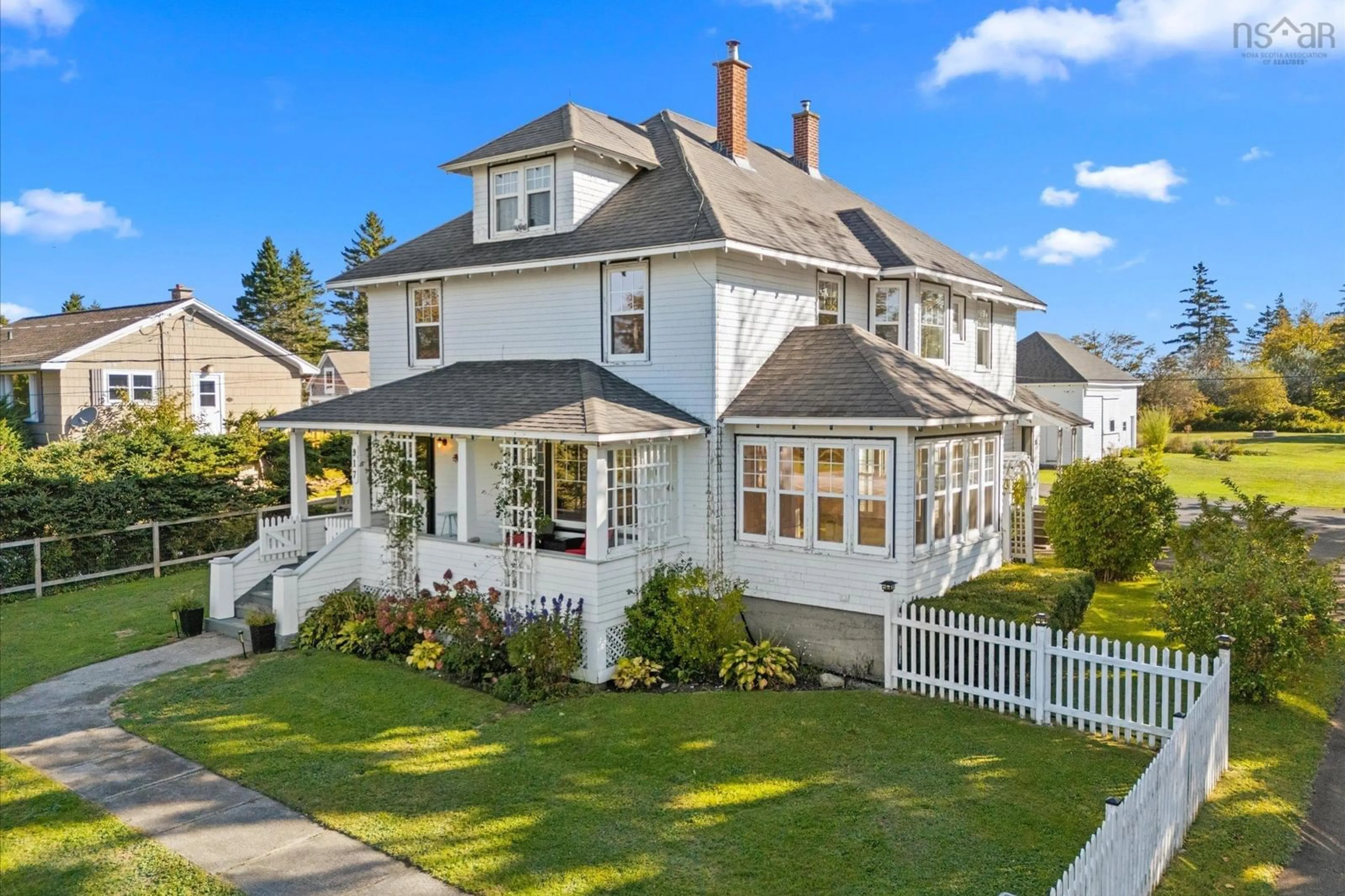 A pic from outside/outdoor area/front of a property/back of a property/a pic from drone, street for 917 Highway 335, West Pubnico Nova Scotia B0W 3S0
