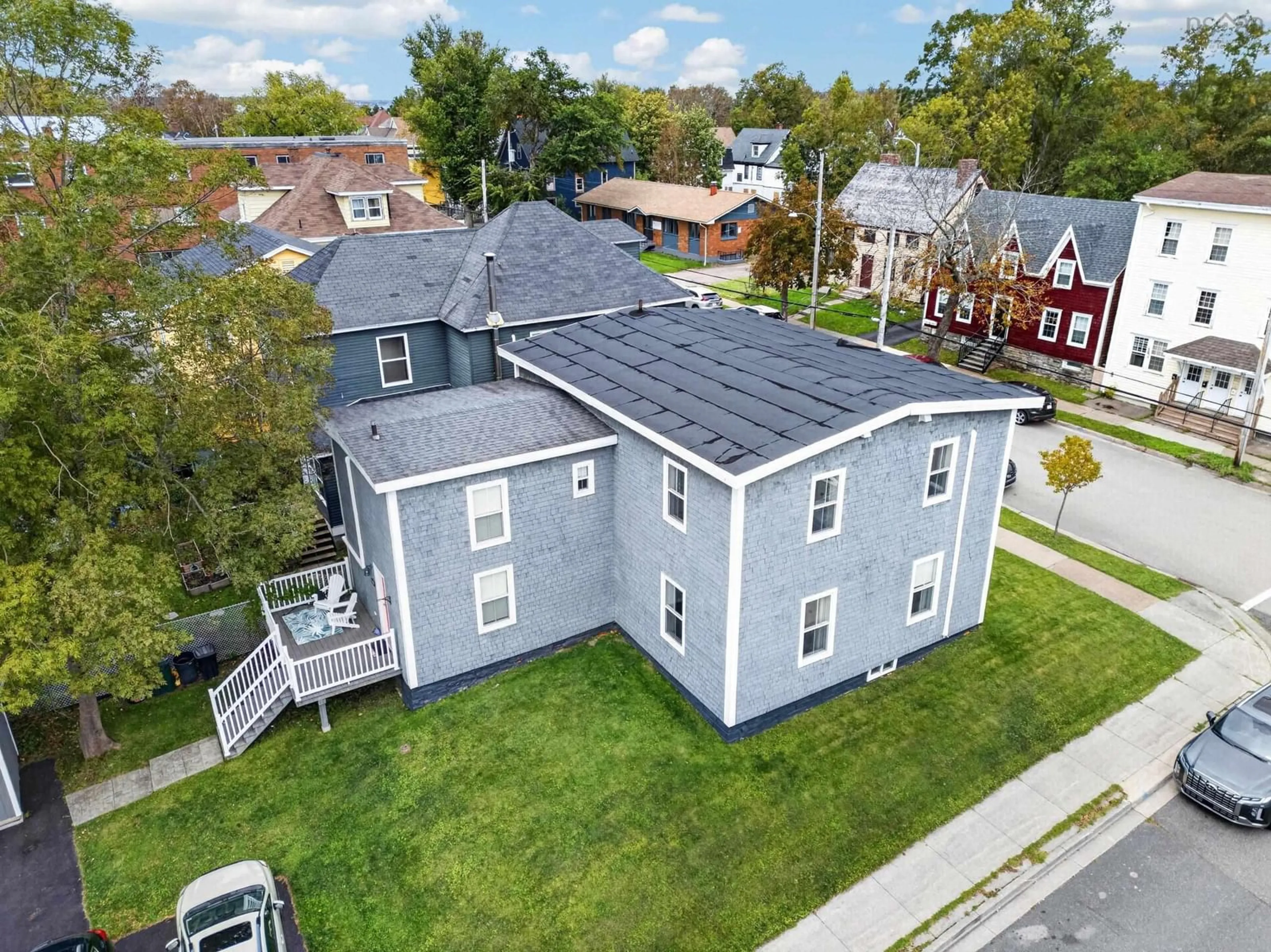 A pic from outside/outdoor area/front of a property/back of a property/a pic from drone, building for 84 Charlotte Street, Sydney Nova Scotia B1P 1B7