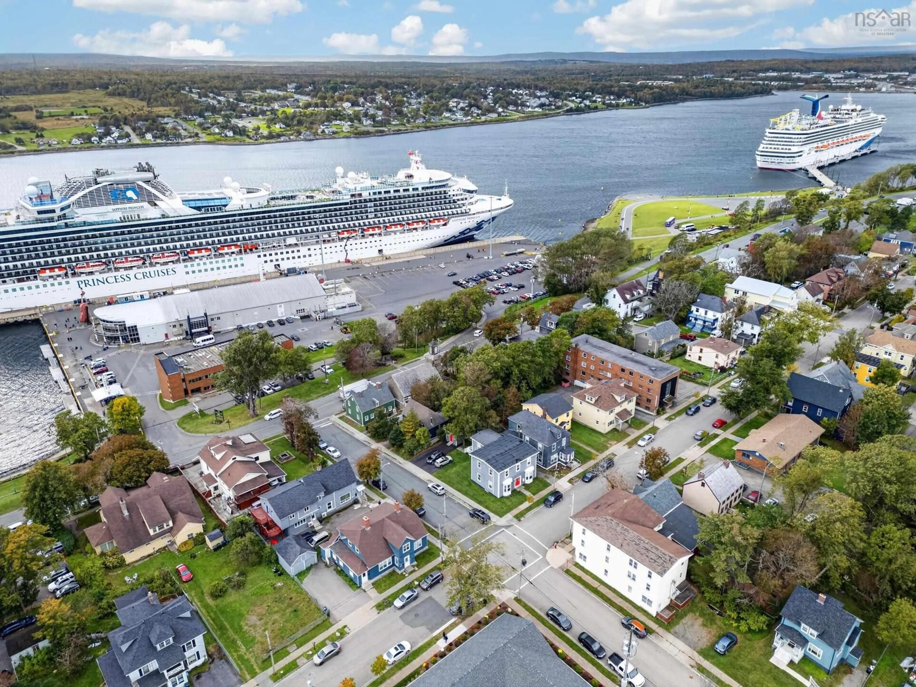 A pic from outside/outdoor area/front of a property/back of a property/a pic from drone, water/lake/river/ocean view for 84 Charlotte Street, Sydney Nova Scotia B1P 1B7