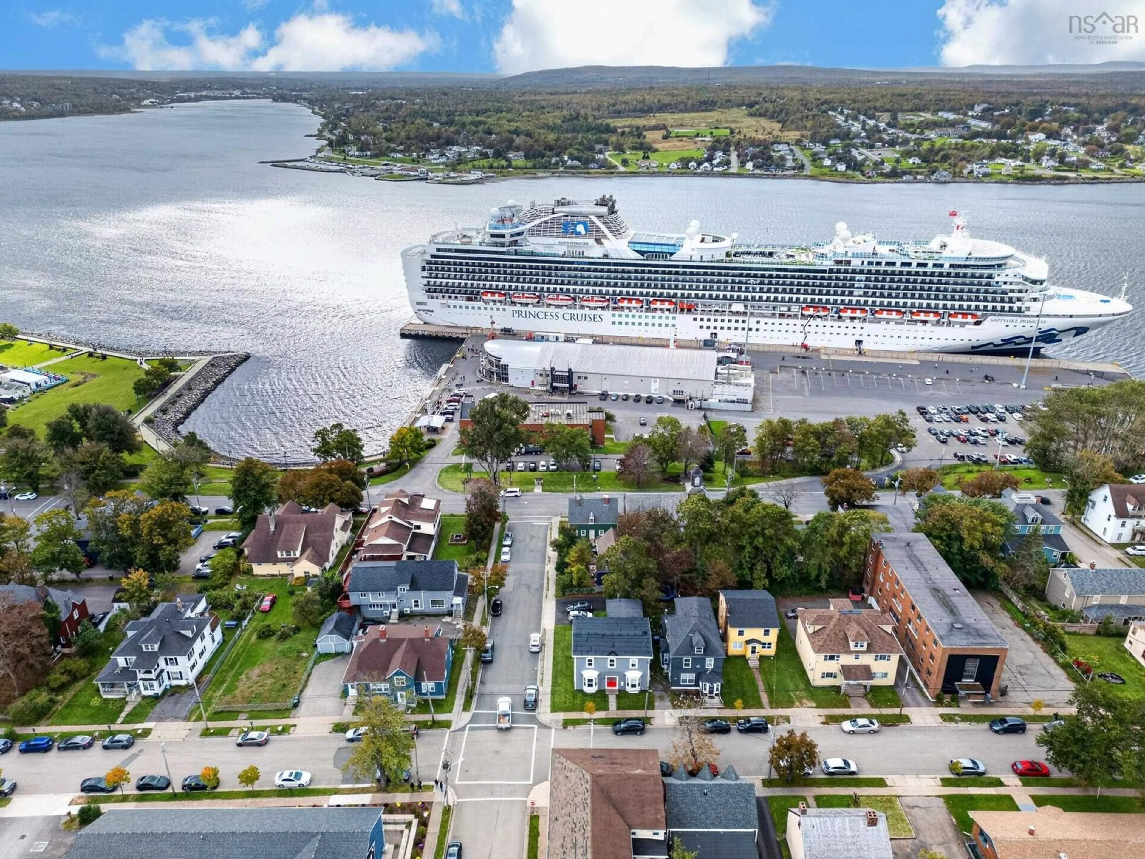 A pic from outside/outdoor area/front of a property/back of a property/a pic from drone, water/lake/river/ocean view for 84 Charlotte Street, Sydney Nova Scotia B1P 1B7
