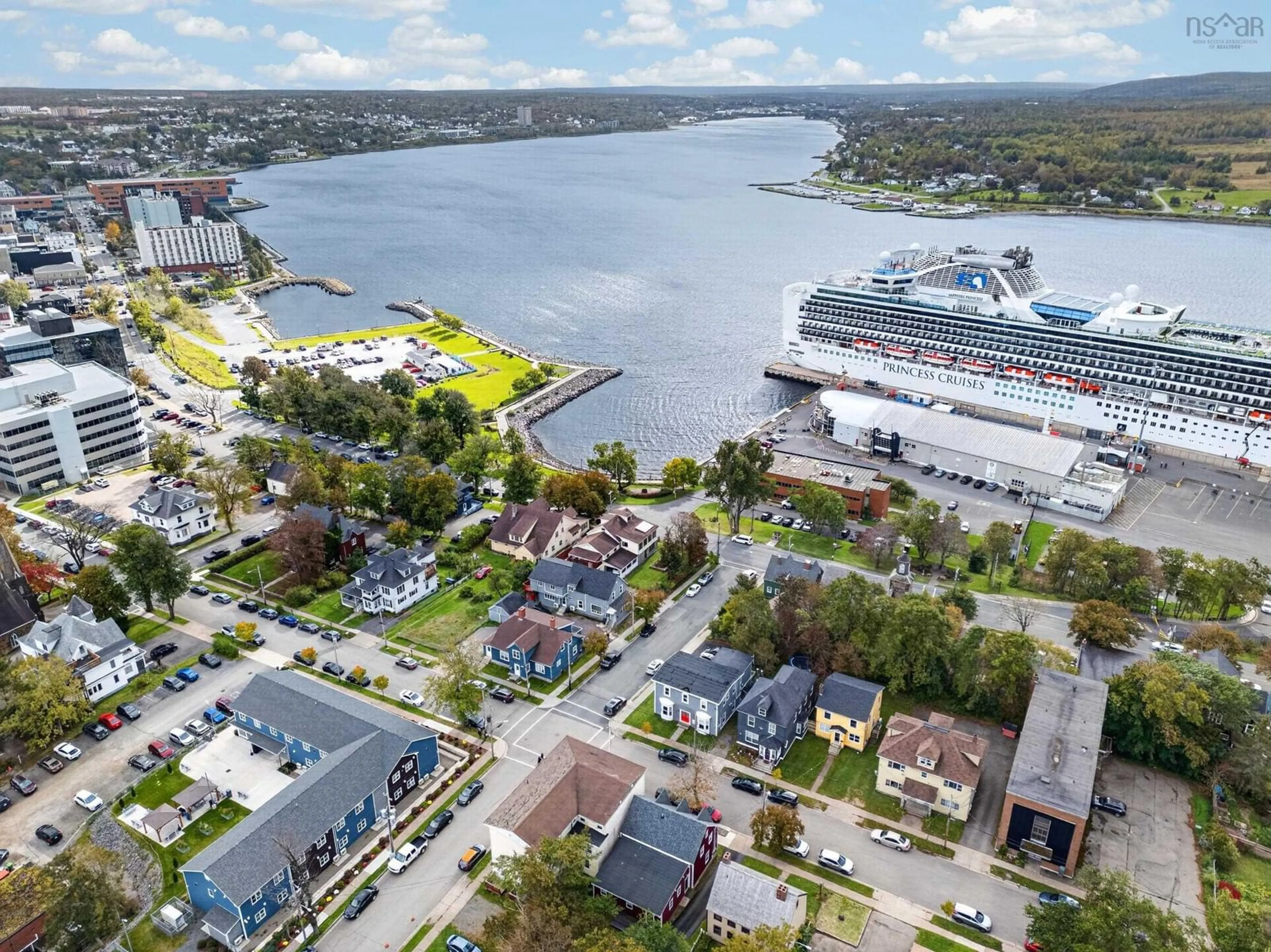 A pic from outside/outdoor area/front of a property/back of a property/a pic from drone, water/lake/river/ocean view for 84 Charlotte Street, Sydney Nova Scotia B1P 1B7