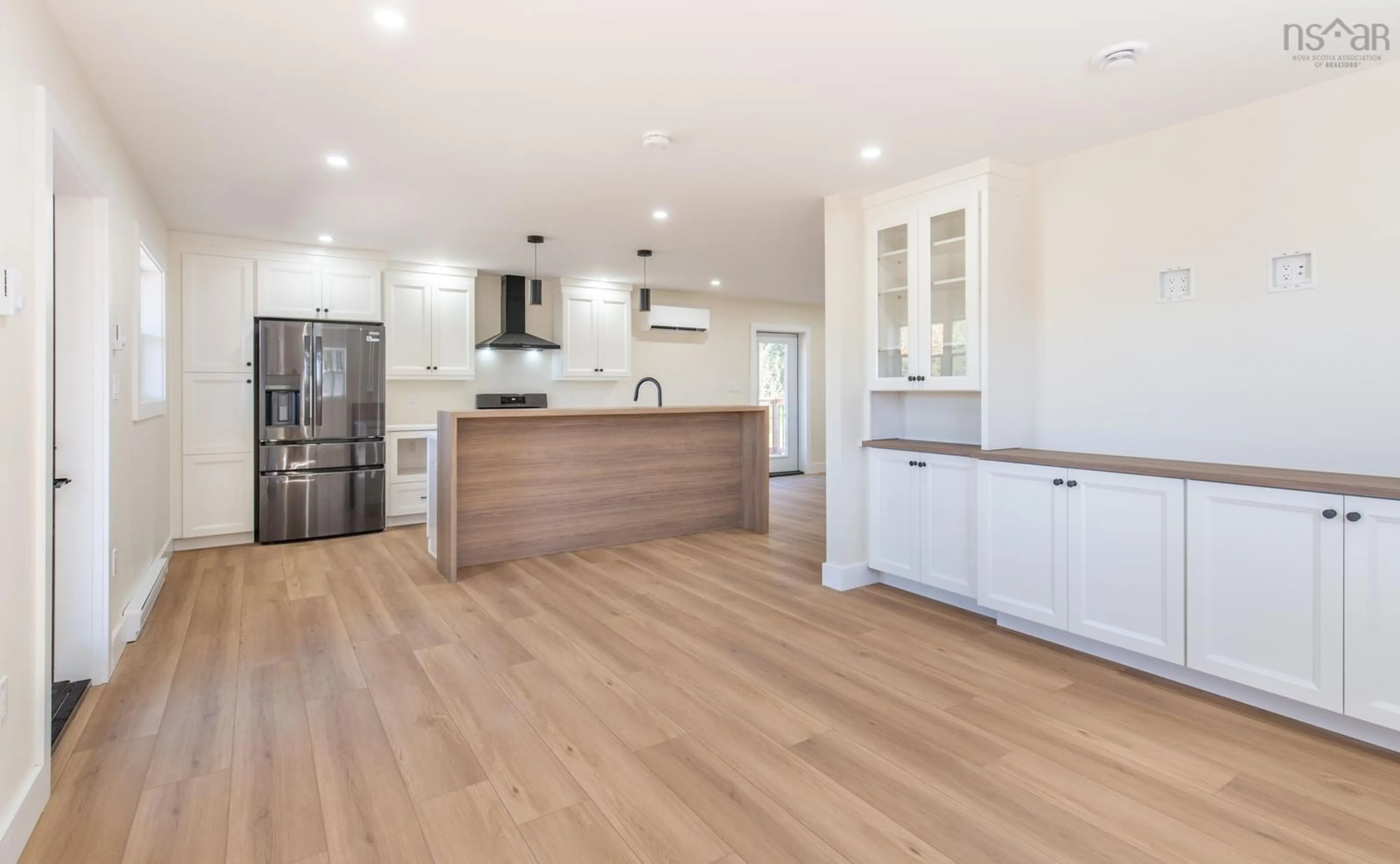 Open concept kitchen, wood/laminate floor for 284 Highway 334, Arcadia Nova Scotia B0W 1B0