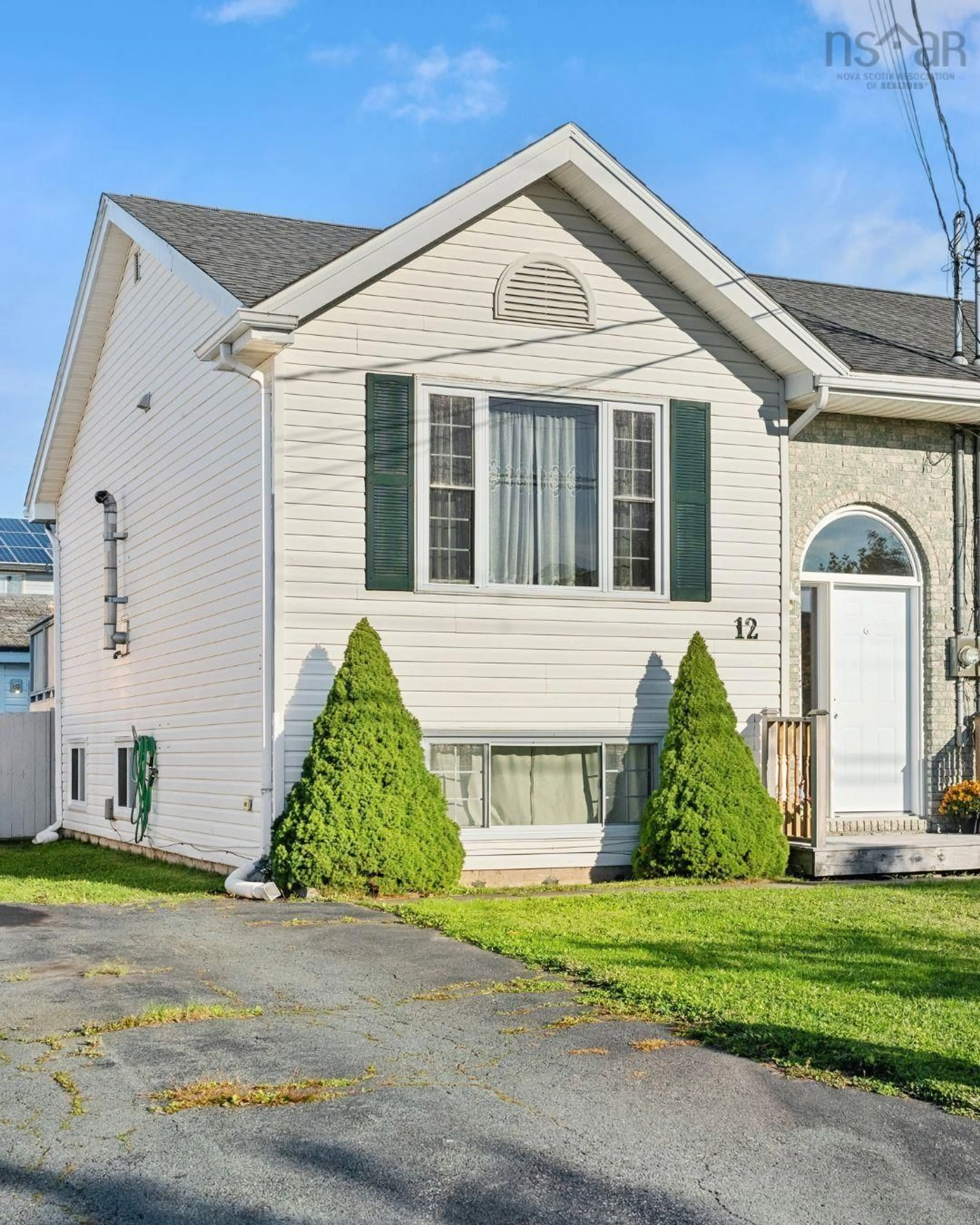 Home with vinyl exterior material, street for 12 Kohar Crt, Eastern Passage Nova Scotia B3G 1N5