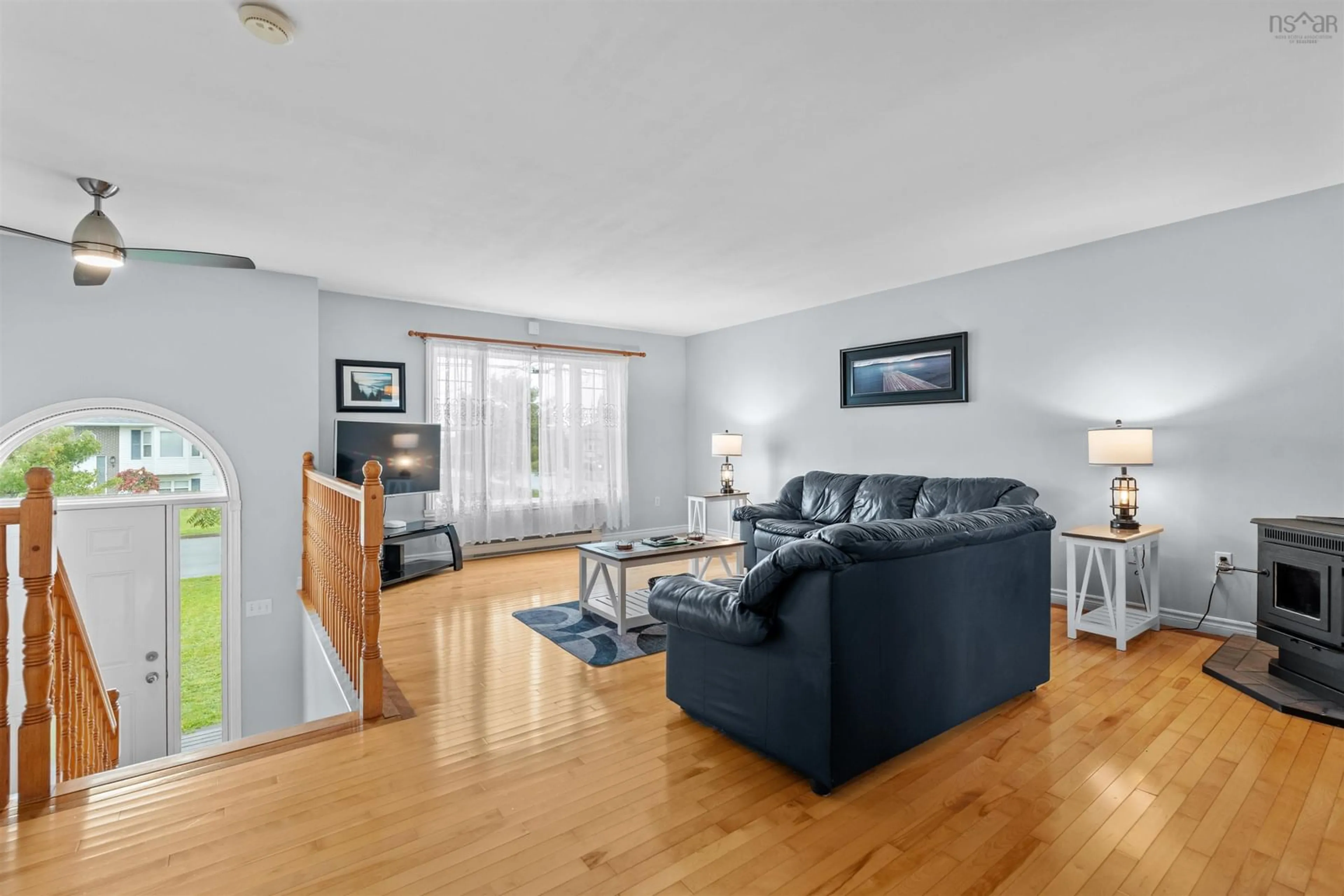 Living room with furniture, wood/laminate floor for 12 Kohar Crt, Eastern Passage Nova Scotia B3G 1N5