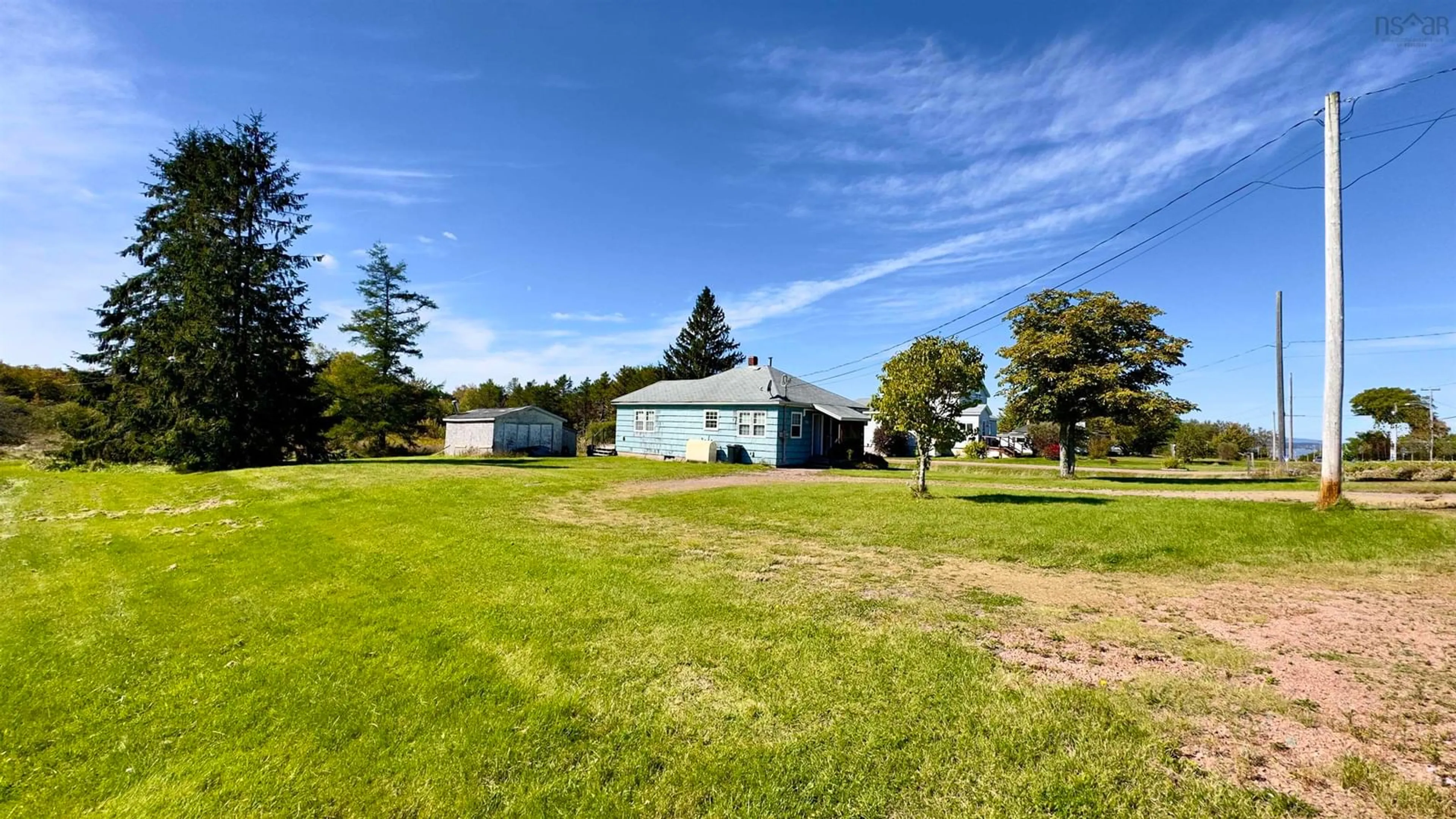 A pic from outside/outdoor area/front of a property/back of a property/a pic from drone, water/lake/river/ocean view for 156 Highway 242, Joggins Nova Scotia B0L 1A0