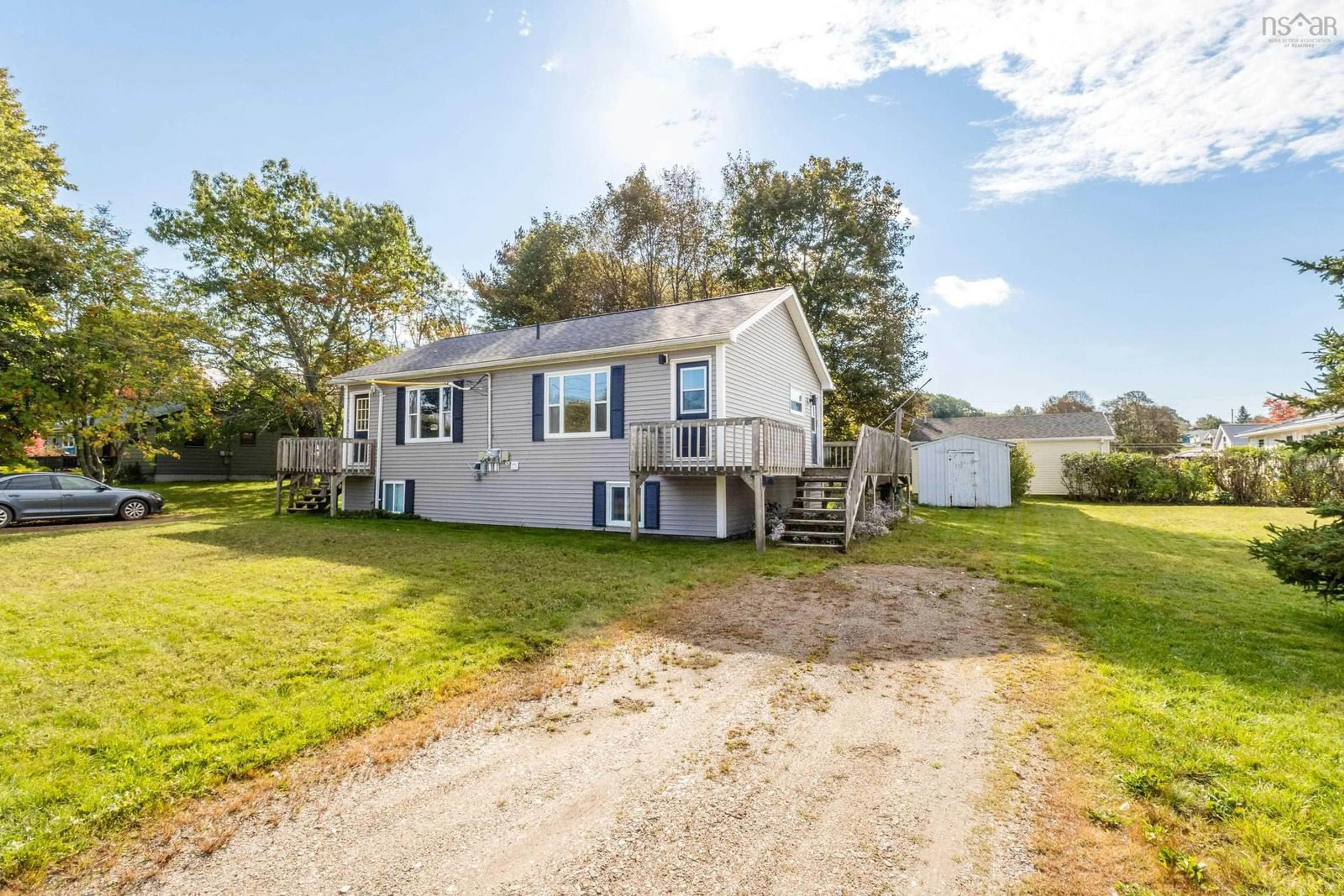 A pic from outside/outdoor area/front of a property/back of a property/a pic from drone, water/lake/river/ocean view for 1063/1065 Camhill Crt, North Kentville Nova Scotia B4N 2X5