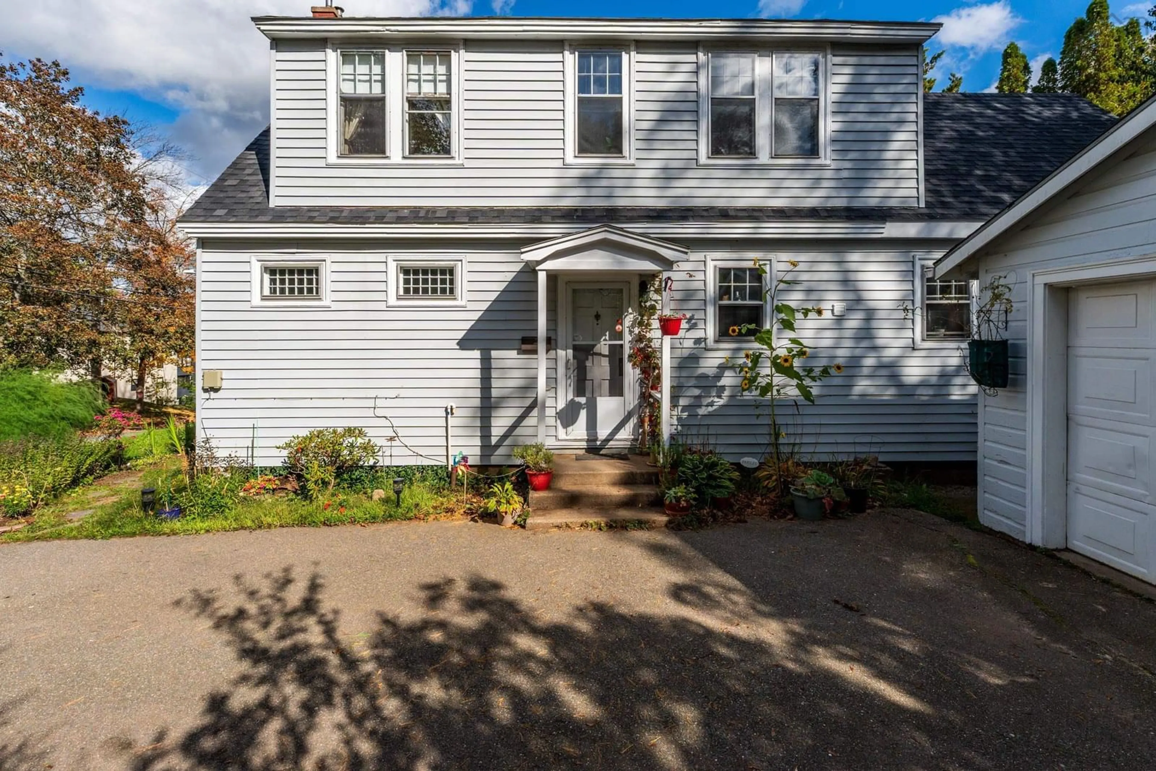 Home with vinyl exterior material, street for 1 Orchard Road, Kentville Nova Scotia B4N 1R7