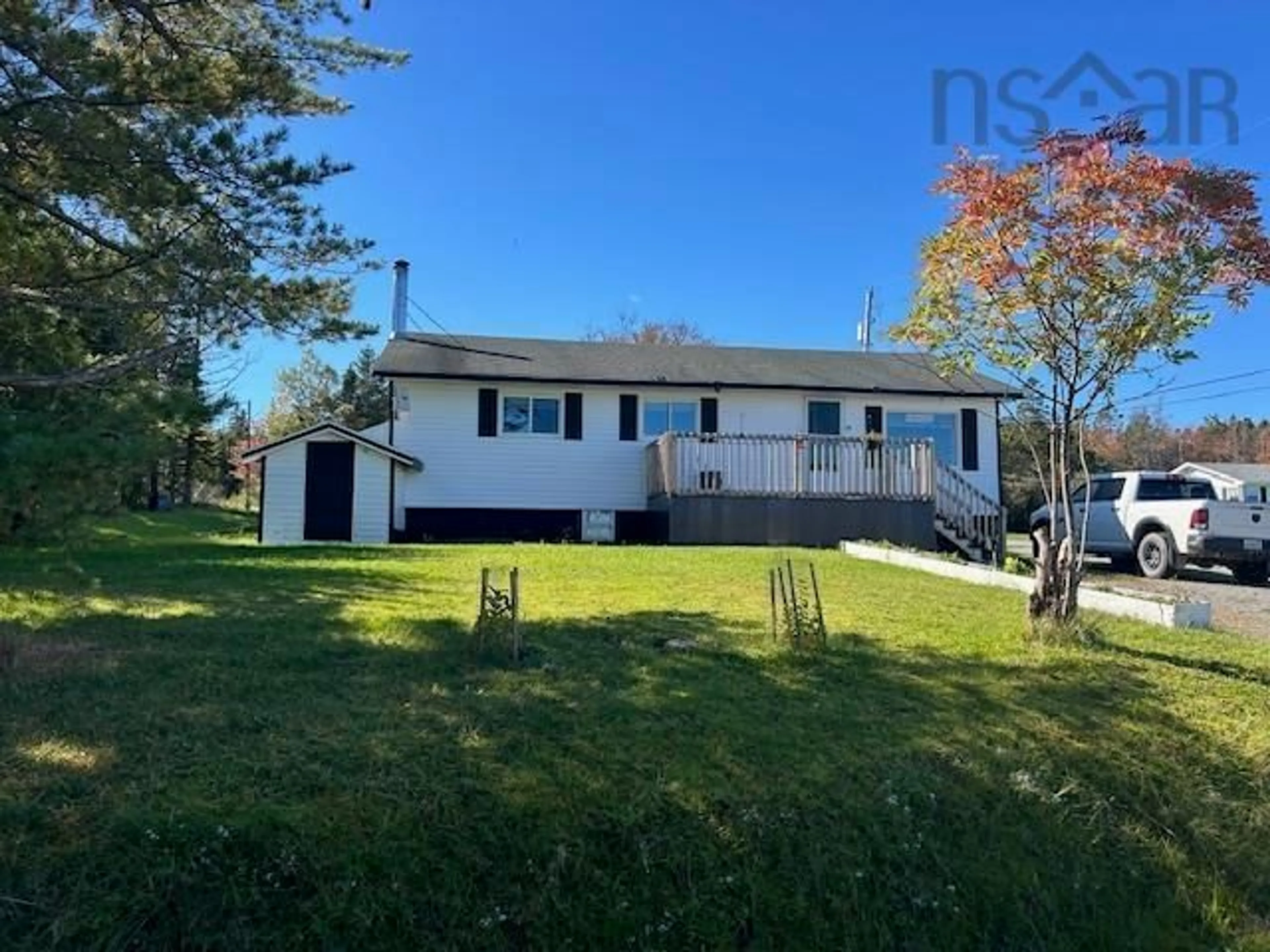 A pic from outside/outdoor area/front of a property/back of a property/a pic from drone, water/lake/river/ocean view for 29 Lakeview Dr, St. Peter's Nova Scotia B0E 3B0