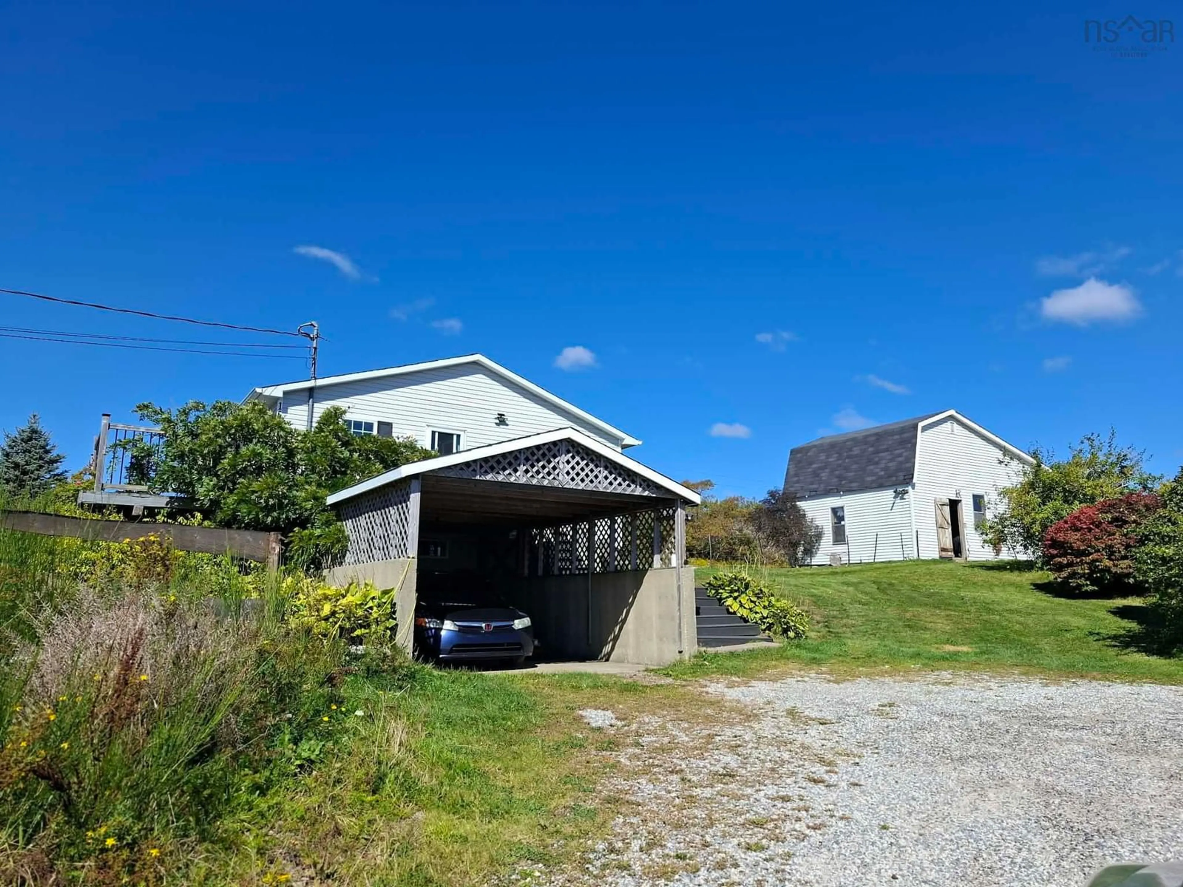 A pic from outside/outdoor area/front of a property/back of a property/a pic from drone, street for 1671 Sandy Point Rd, Sandy Point Nova Scotia B0T 1W0