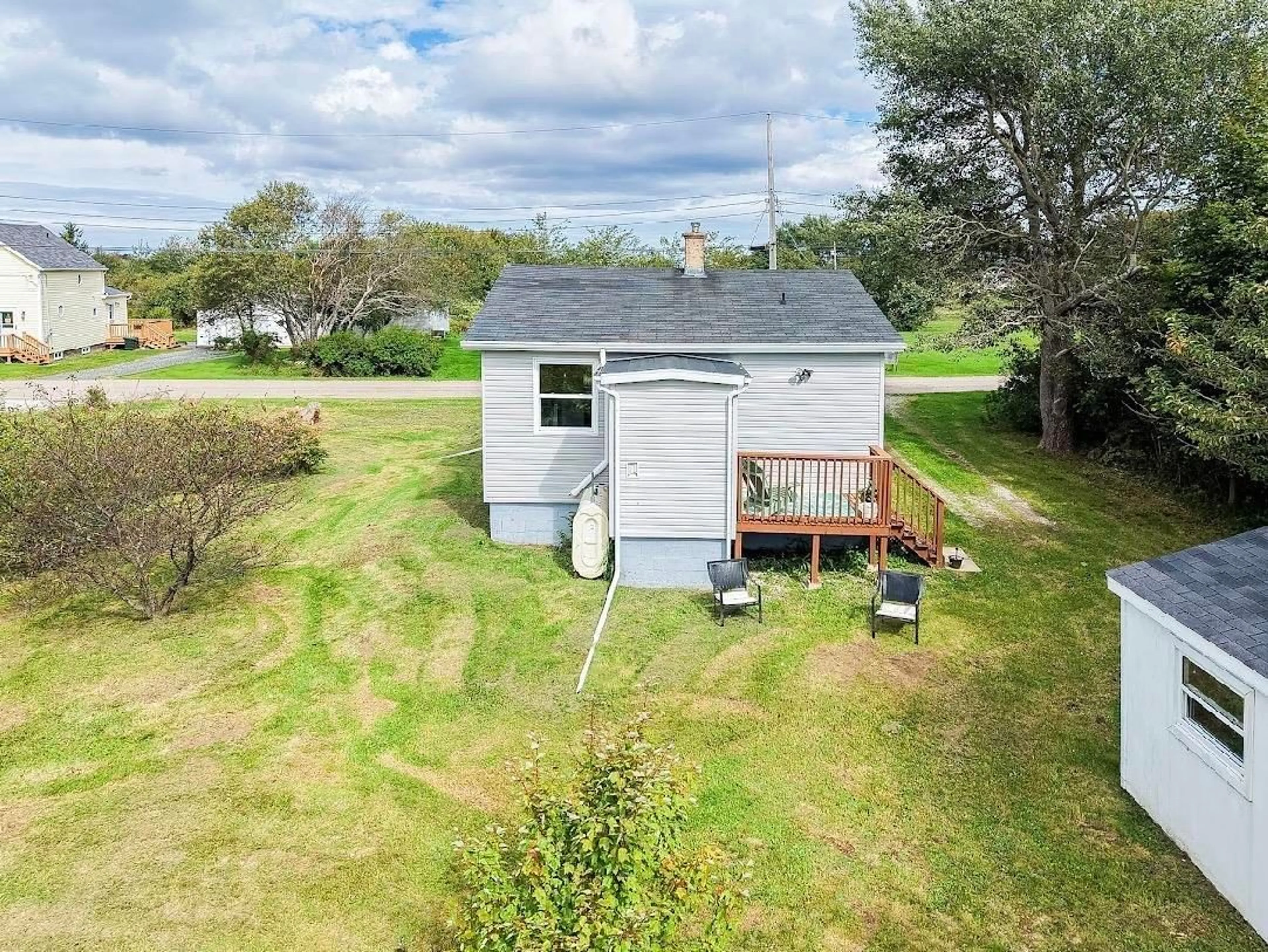 A pic from outside/outdoor area/front of a property/back of a property/a pic from drone, water/lake/river/ocean view for 17 George St, Scotchtown Nova Scotia B1H 1C2