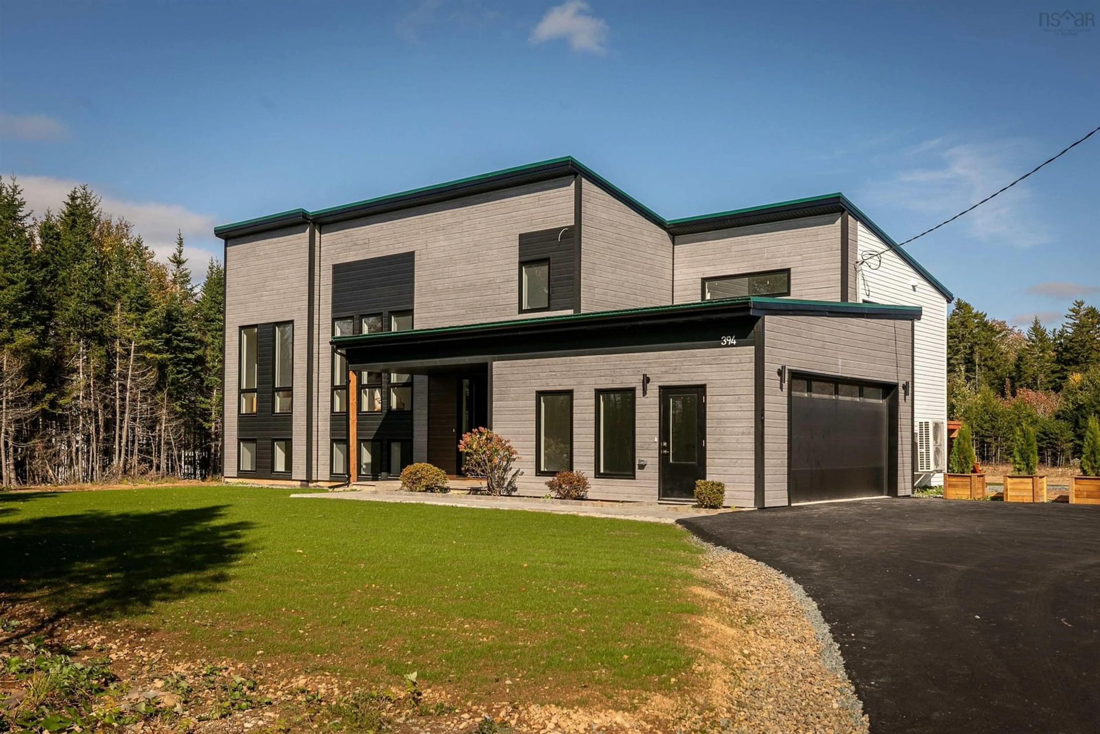 Home with brick exterior material, unknown for 394 Canoe Cres, Hammonds Plains Nova Scotia B4B 2P5