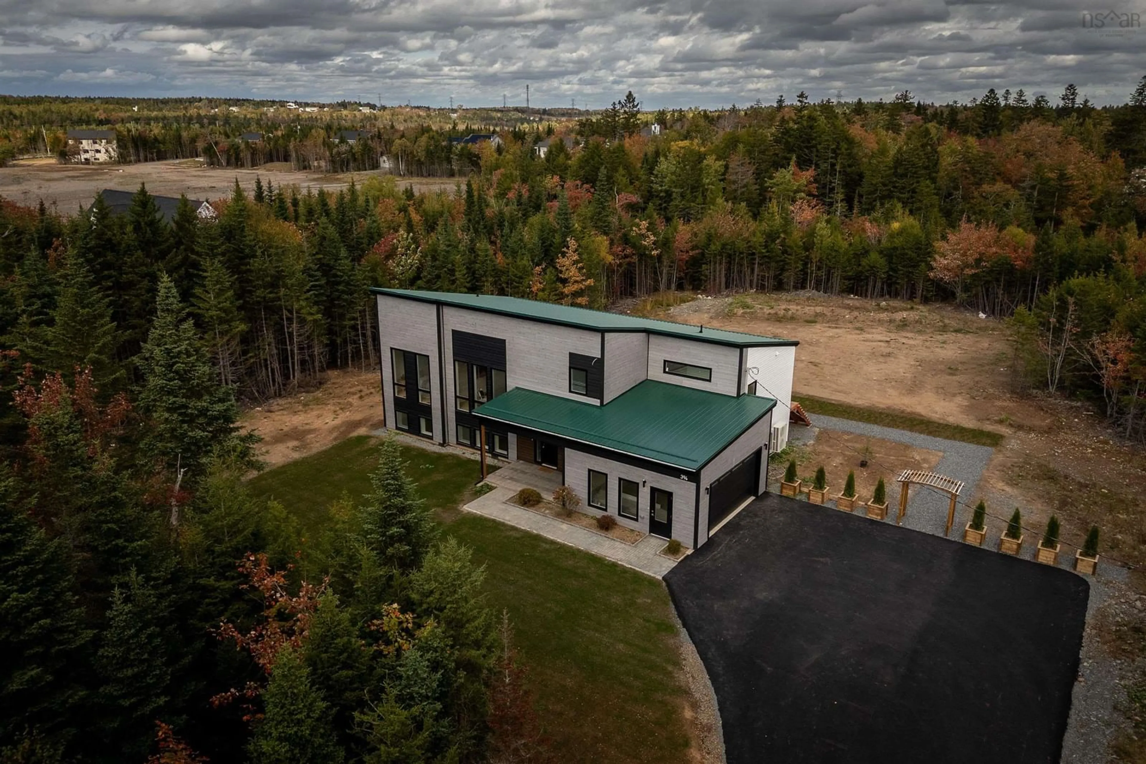A pic from outside/outdoor area/front of a property/back of a property/a pic from drone, unknown for 394 Canoe Cres, Hammonds Plains Nova Scotia B4B 2P5