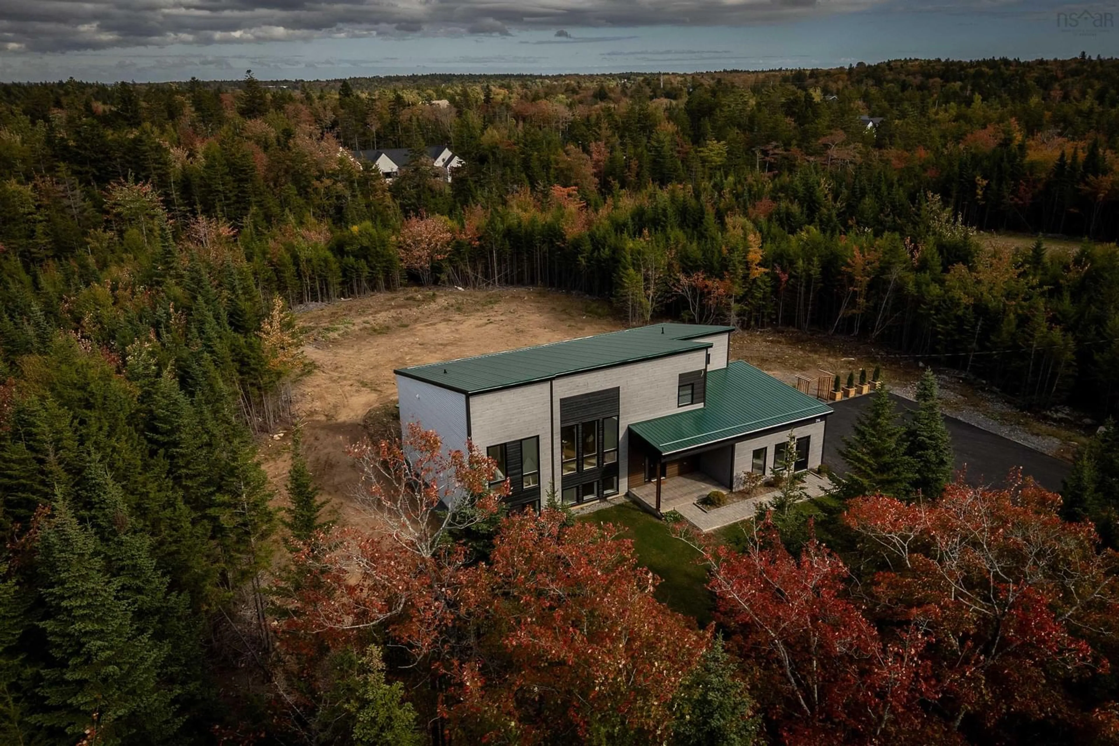 A pic from outside/outdoor area/front of a property/back of a property/a pic from drone, forest/trees view for 394 Canoe Cres, Hammonds Plains Nova Scotia B4B 2P5