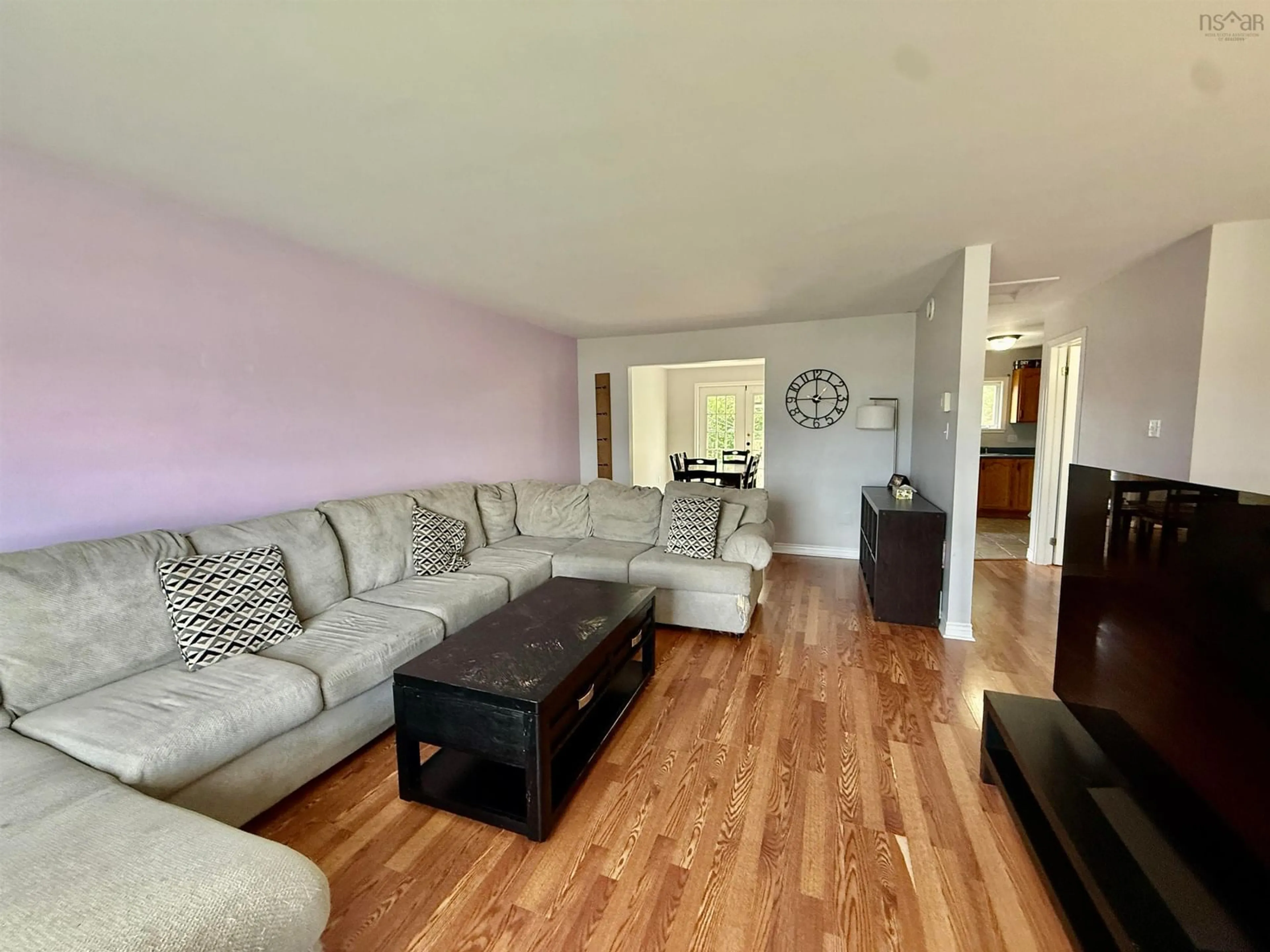 Living room with furniture, wood/laminate floor for 12 Shamrock Crt, Eastern Passage Nova Scotia B3G 1N4
