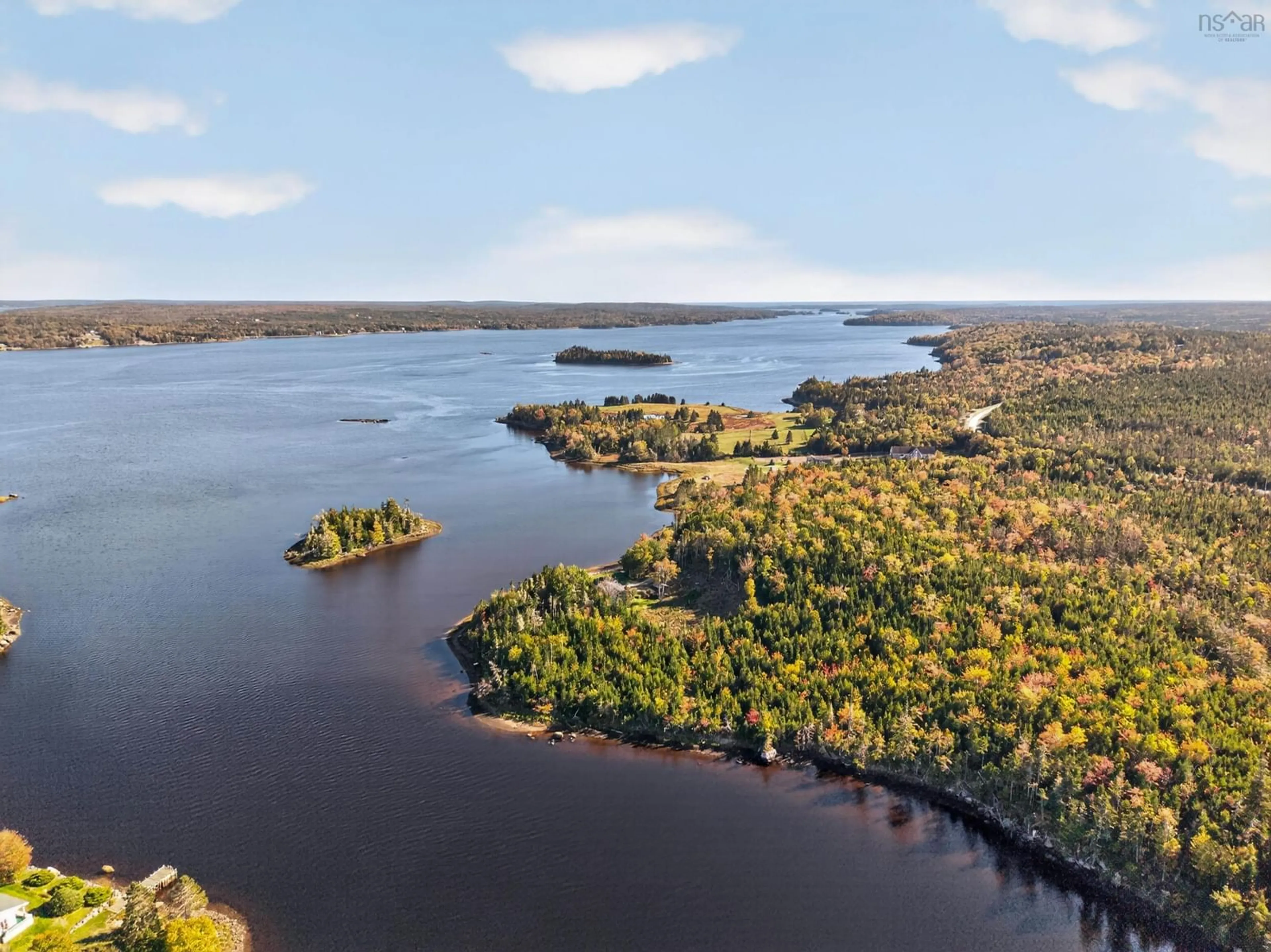 A pic from outside/outdoor area/front of a property/back of a property/a pic from drone, water/lake/river/ocean view for 8280 Highway #7, Musquodoboit Harbour Nova Scotia B0J 2L0