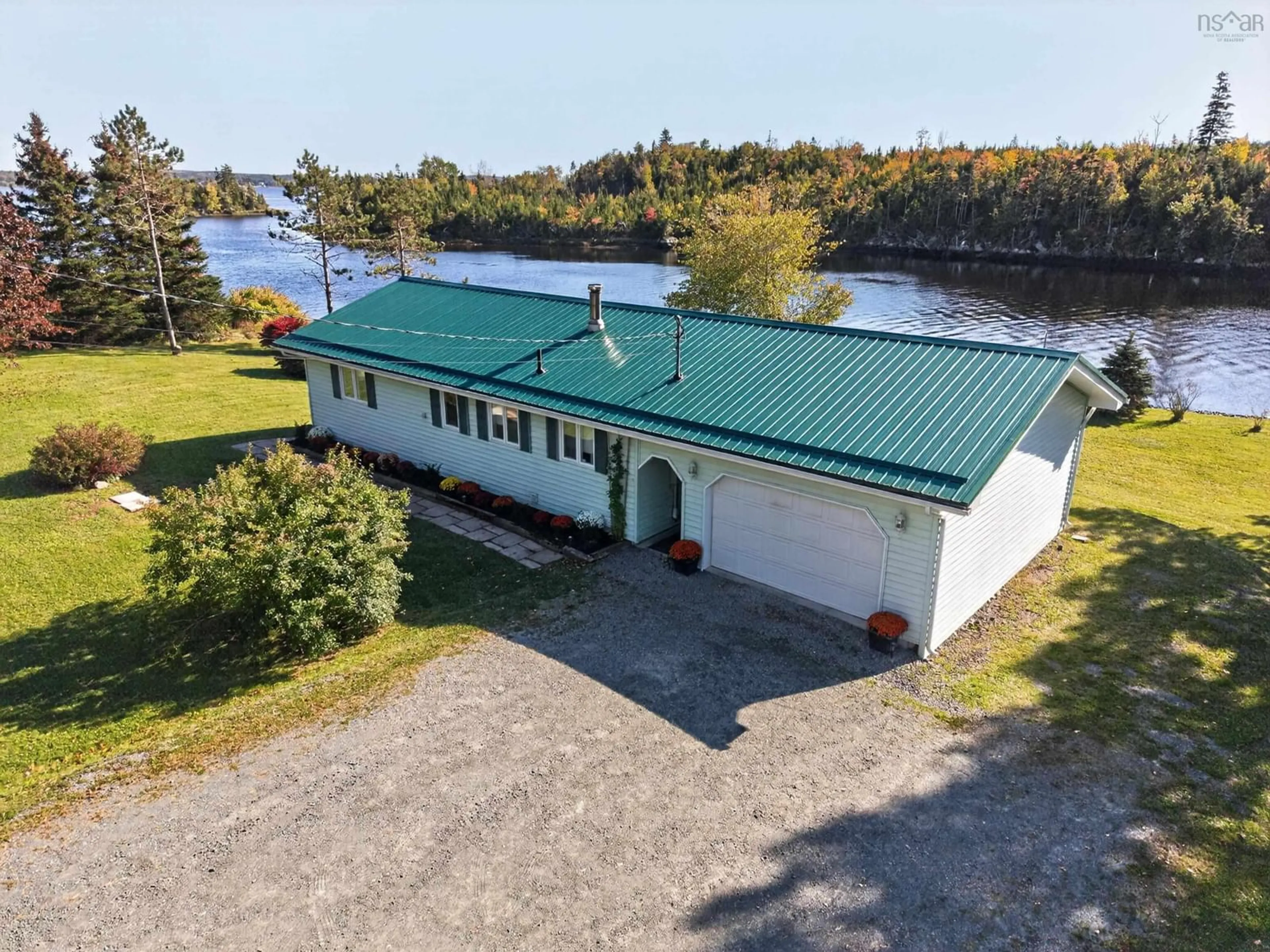 A pic from outside/outdoor area/front of a property/back of a property/a pic from drone, water/lake/river/ocean view for 8280 Highway #7, Musquodoboit Harbour Nova Scotia B0J 2L0