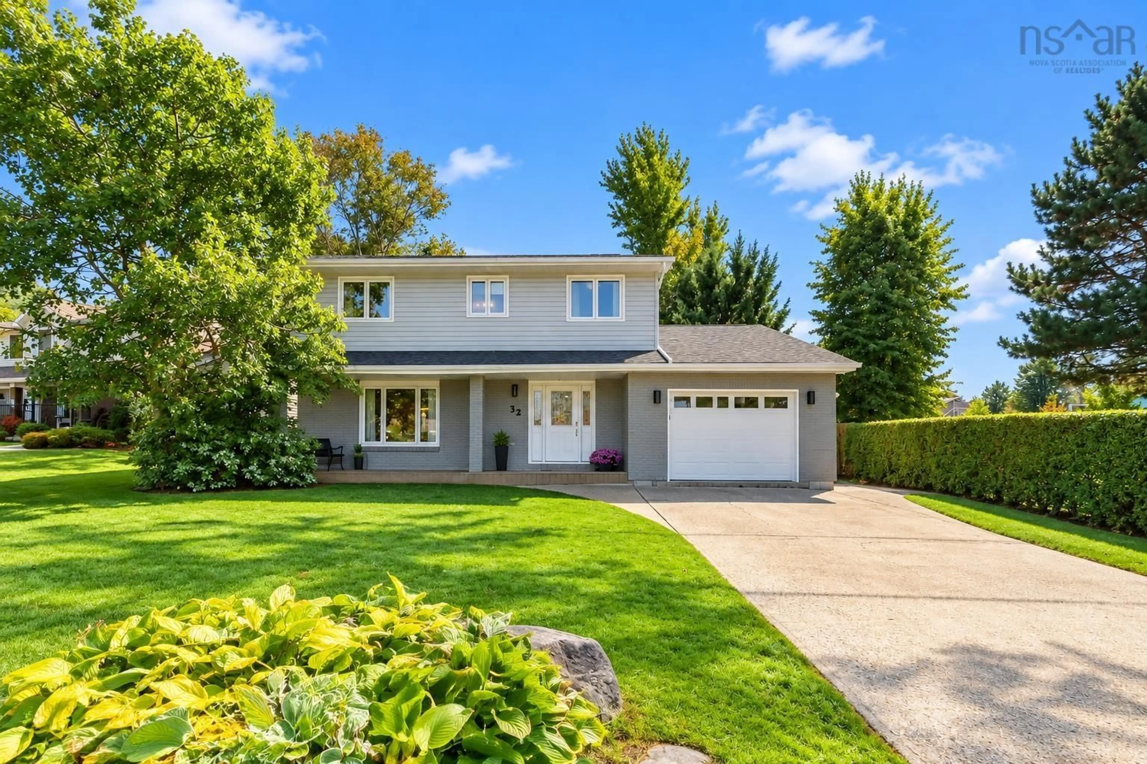 Home with vinyl exterior material, street for 32 Bow St, Dartmouth Nova Scotia B2Y 4P6