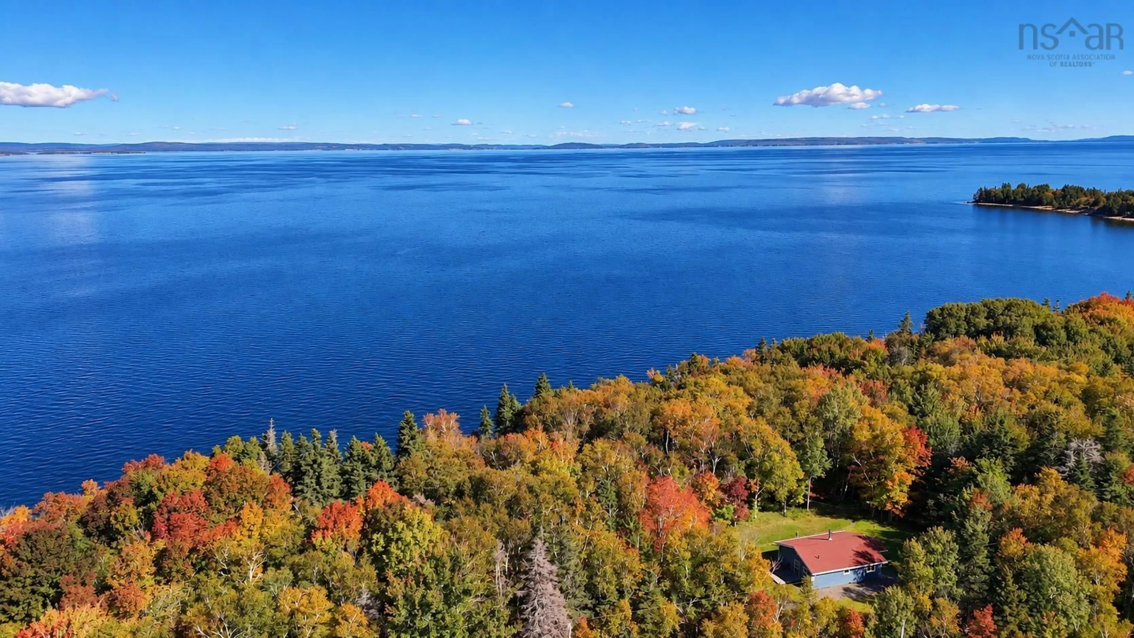A pic from outside/outdoor area/front of a property/back of a property/a pic from drone, water/lake/river/ocean view for 5735 West Bay Rd, Roberta Nova Scotia B0E 3K0