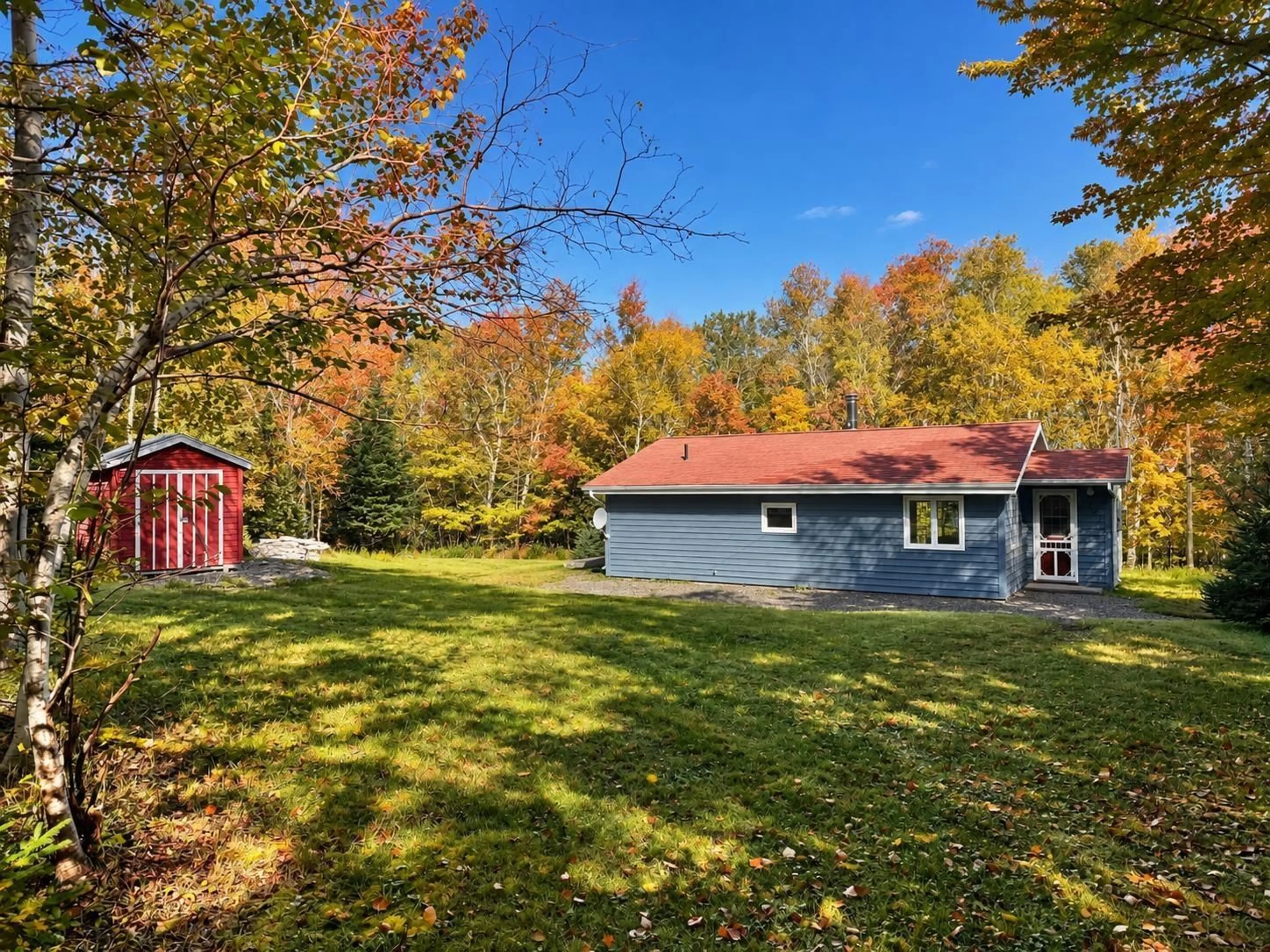 A pic from outside/outdoor area/front of a property/back of a property/a pic from drone, forest/trees view for 5735 West Bay Rd, Roberta Nova Scotia B0E 3K0