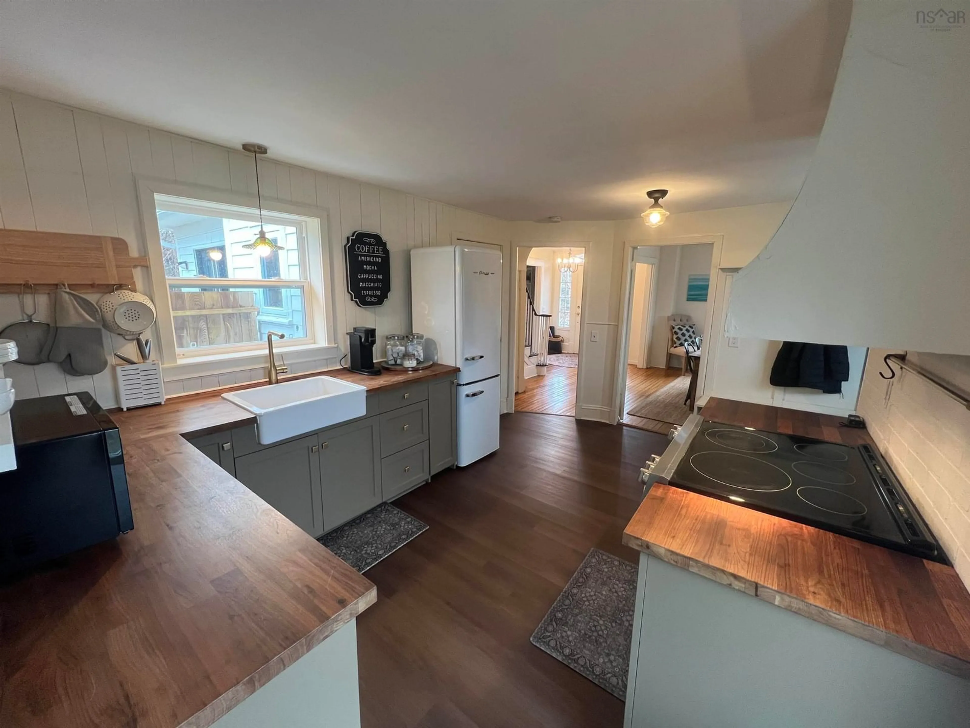 Open concept kitchen, wood/laminate floor for 2703 Highway 362, Margaretsville Nova Scotia B0S 1P0