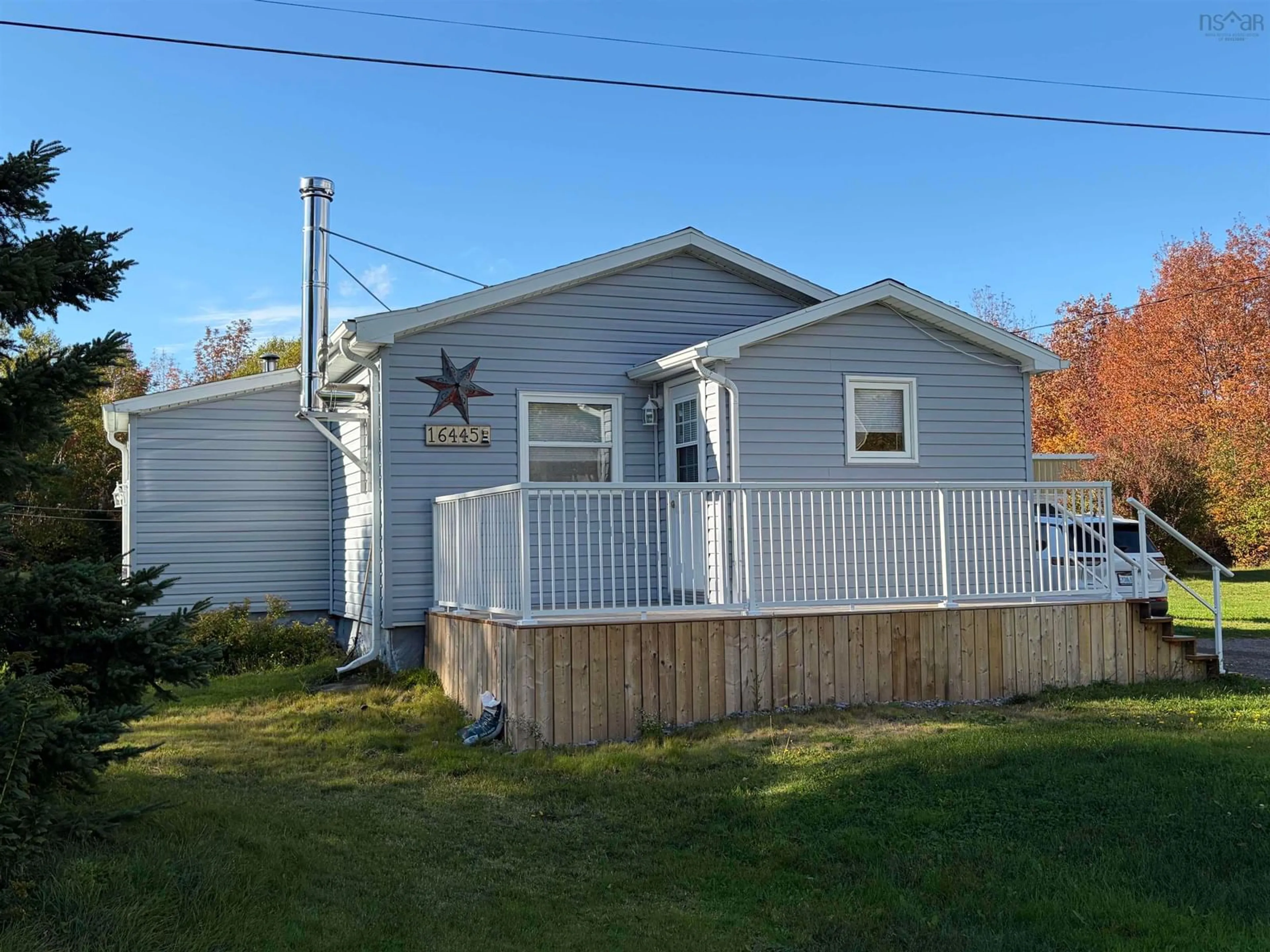 Home with vinyl exterior material, street for 16445 Cabot Trail, La Prairie Nova Scotia B0E 1H0