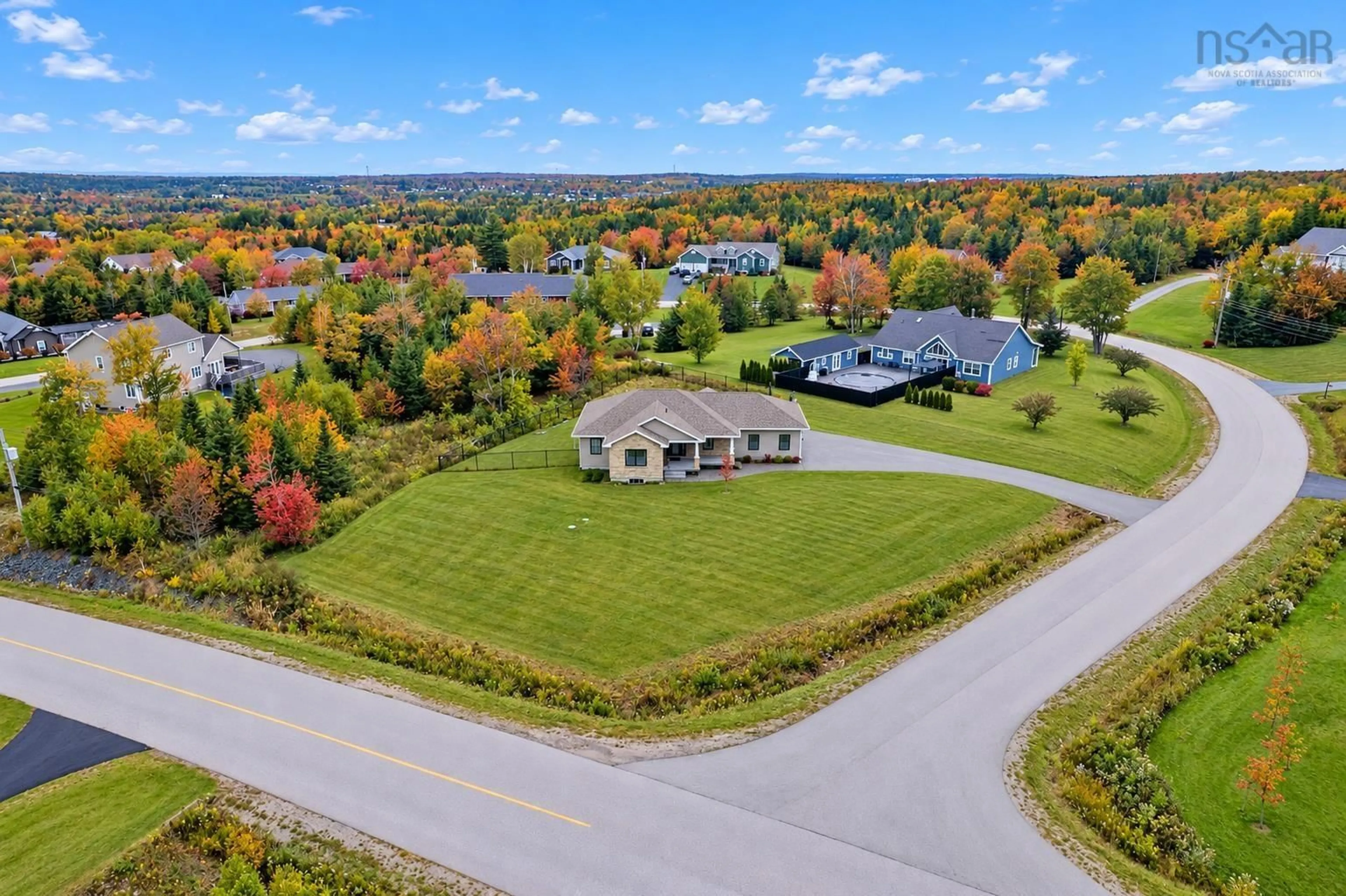 A pic from outside/outdoor area/front of a property/back of a property/a pic from drone, mountain view for 225 Hampton Dr, Sydney River Nova Scotia B1L 0A7