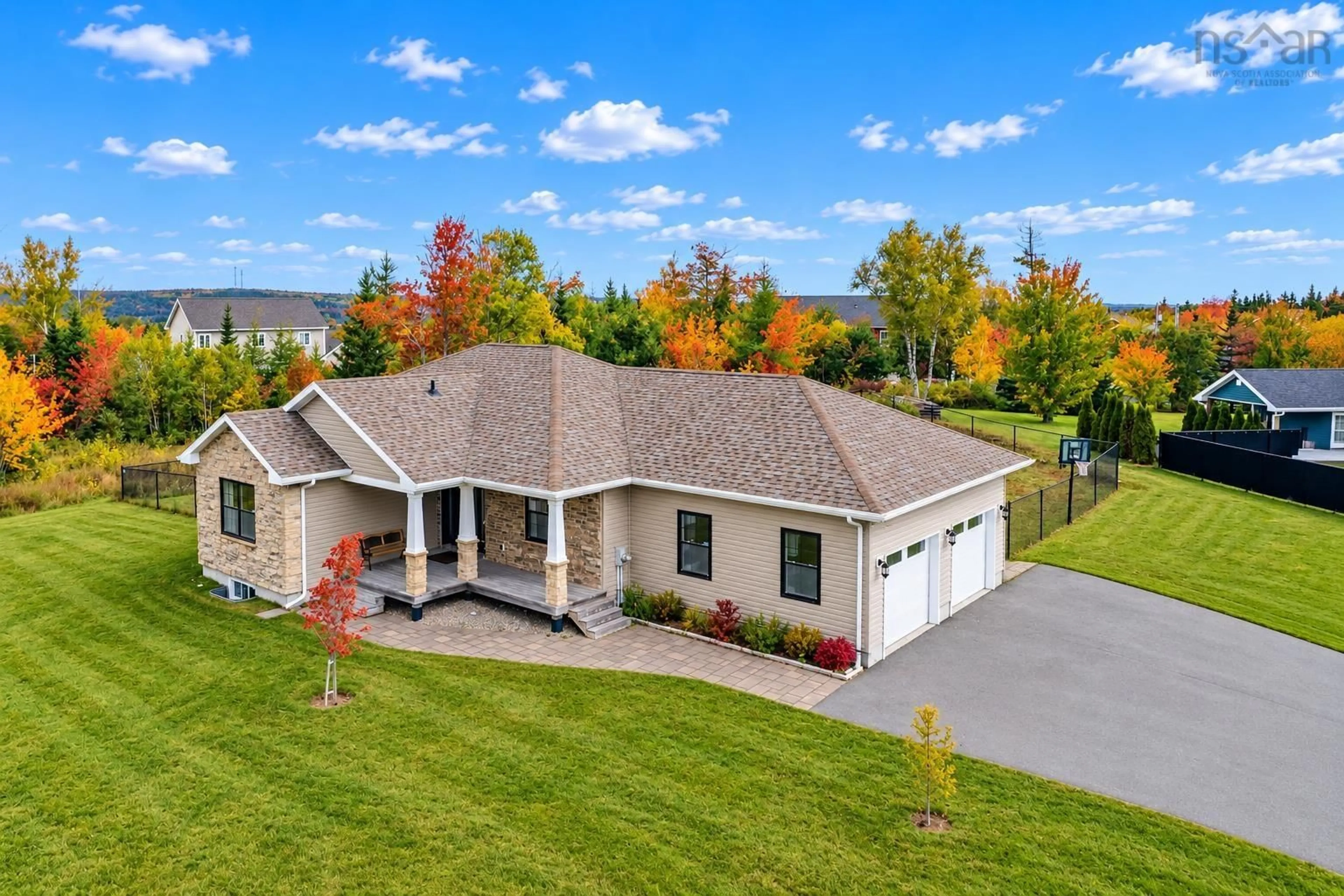 A pic from outside/outdoor area/front of a property/back of a property/a pic from drone, unknown for 225 Hampton Dr, Sydney River Nova Scotia B1L 0A7