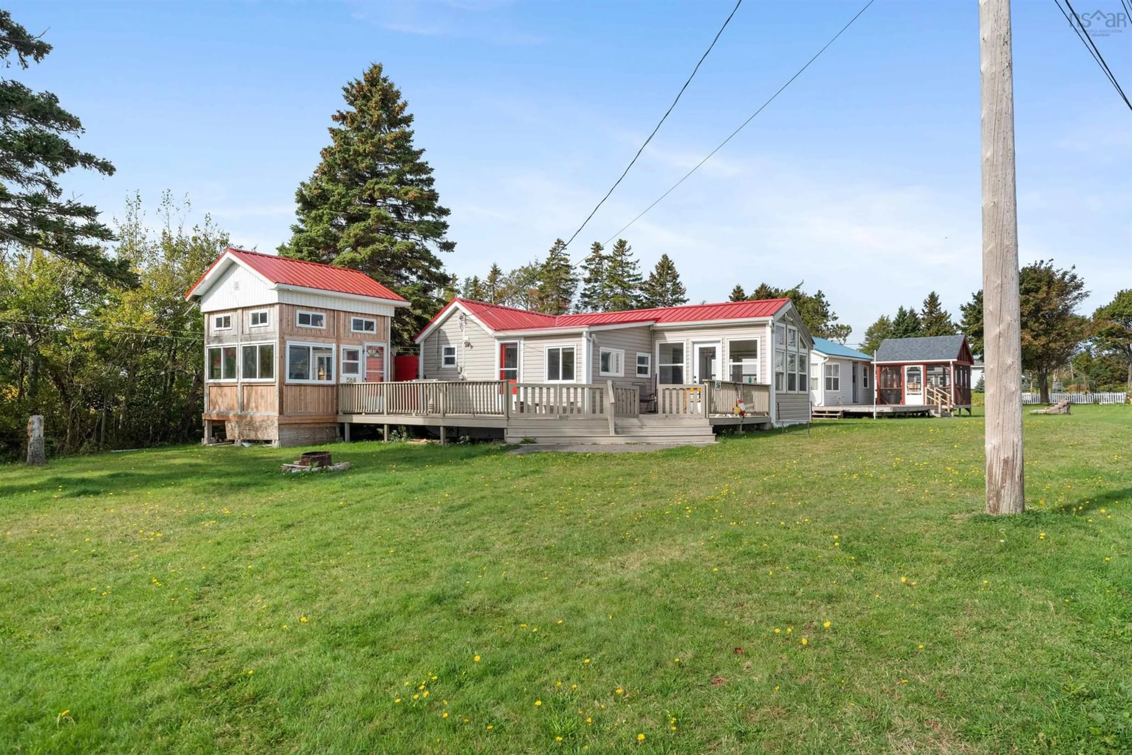 A pic from outside/outdoor area/front of a property/back of a property/a pic from drone, building for 56 Oulton Beach Dr, Lorneville Nova Scotia B4H 3X9
