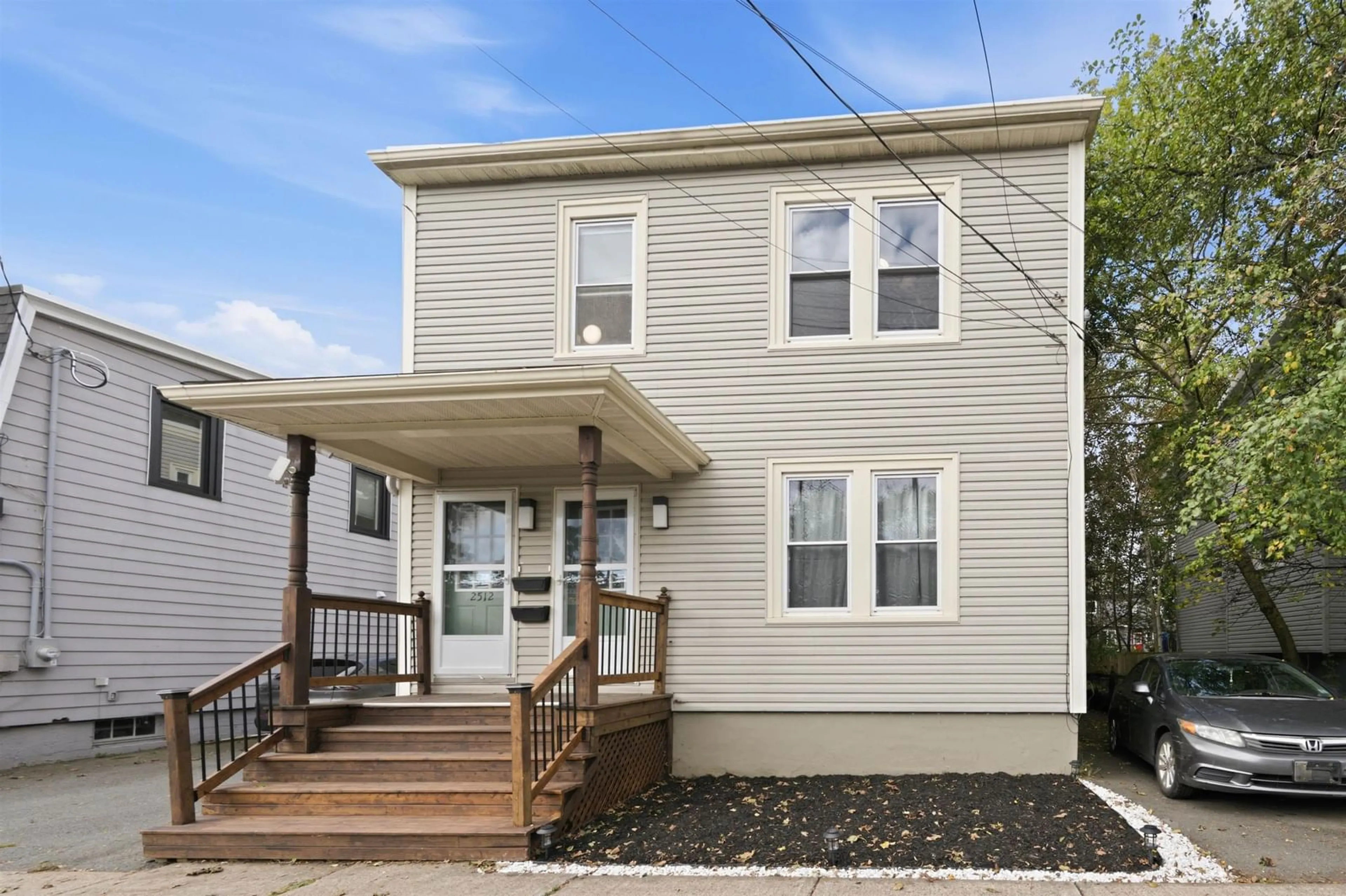 Home with vinyl exterior material, street for 2512 Oxford St, Halifax Peninsula Nova Scotia B3L 2T4