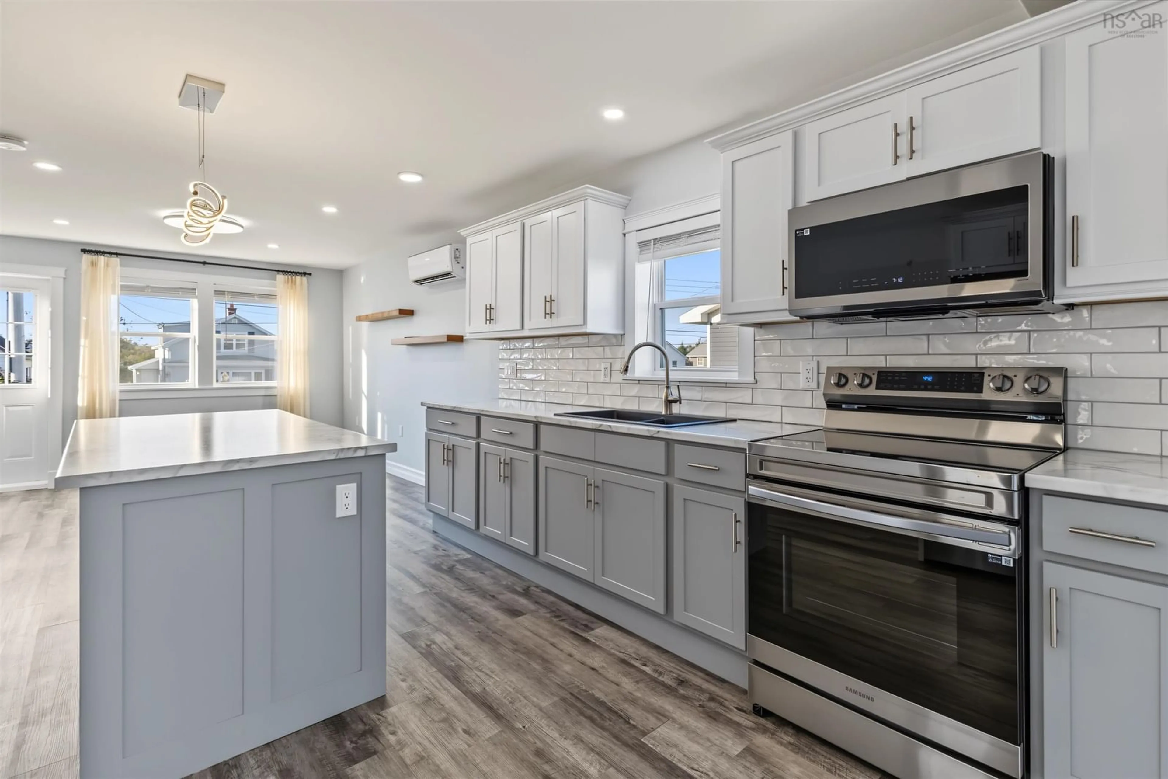 Open concept kitchen, ceramic/tile floor for Brookland St #134, Glace Bay Nova Scotia B1M 1A9