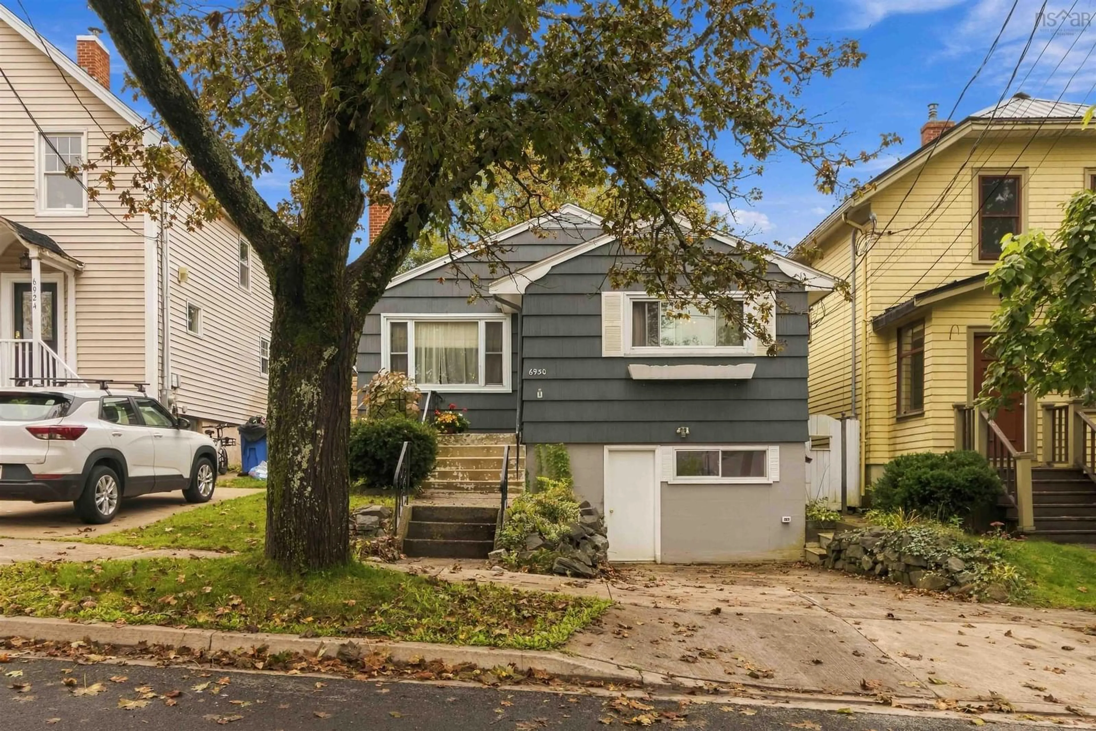 Home with vinyl exterior material, street for 6930 Patricia St, Halifax Regional Municipality Nova Scotia B3L 1J4