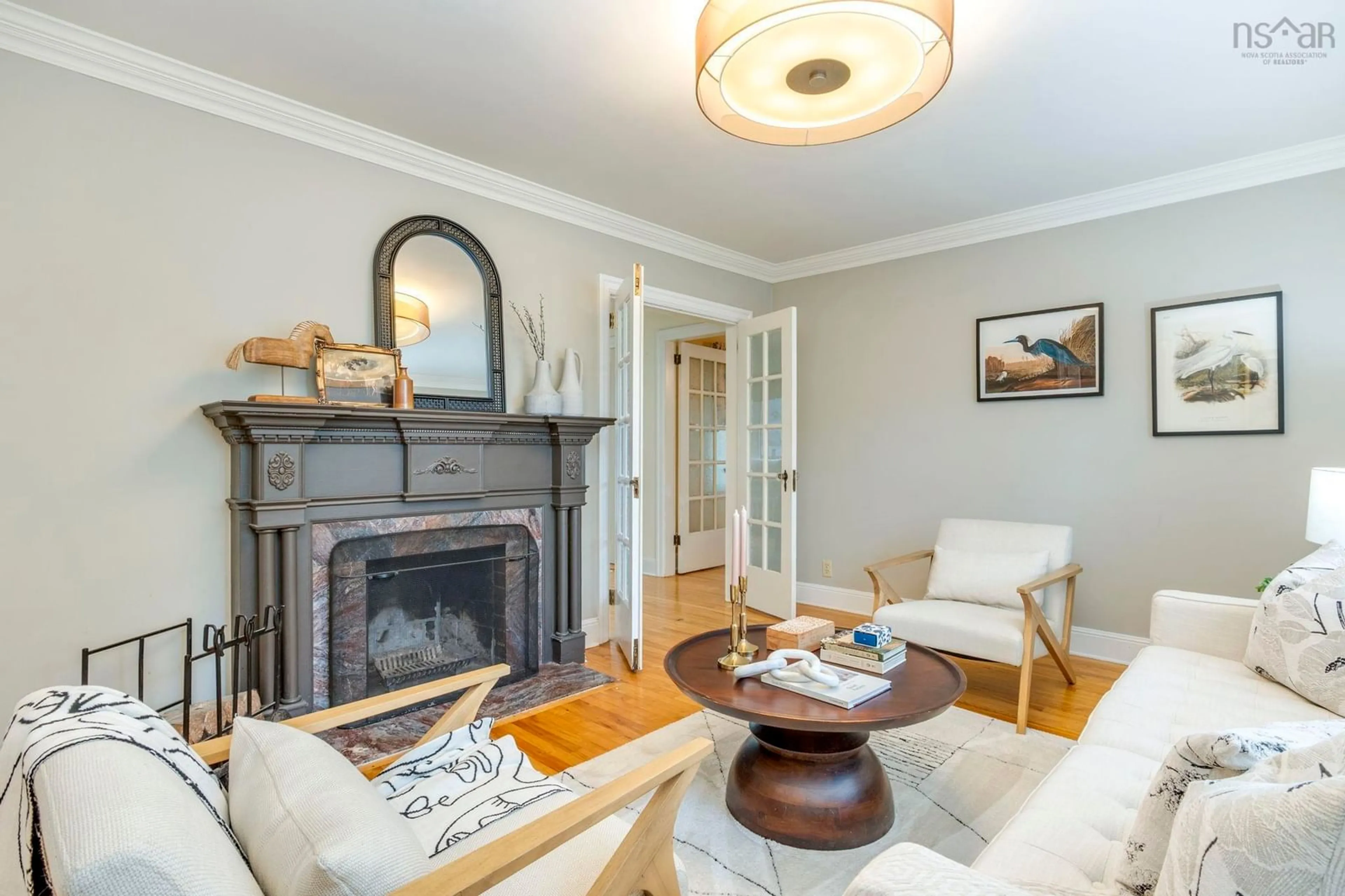Living room with furniture, wood/laminate floor for 2561 Newton Ave, Halifax Nova Scotia B3L 3C4