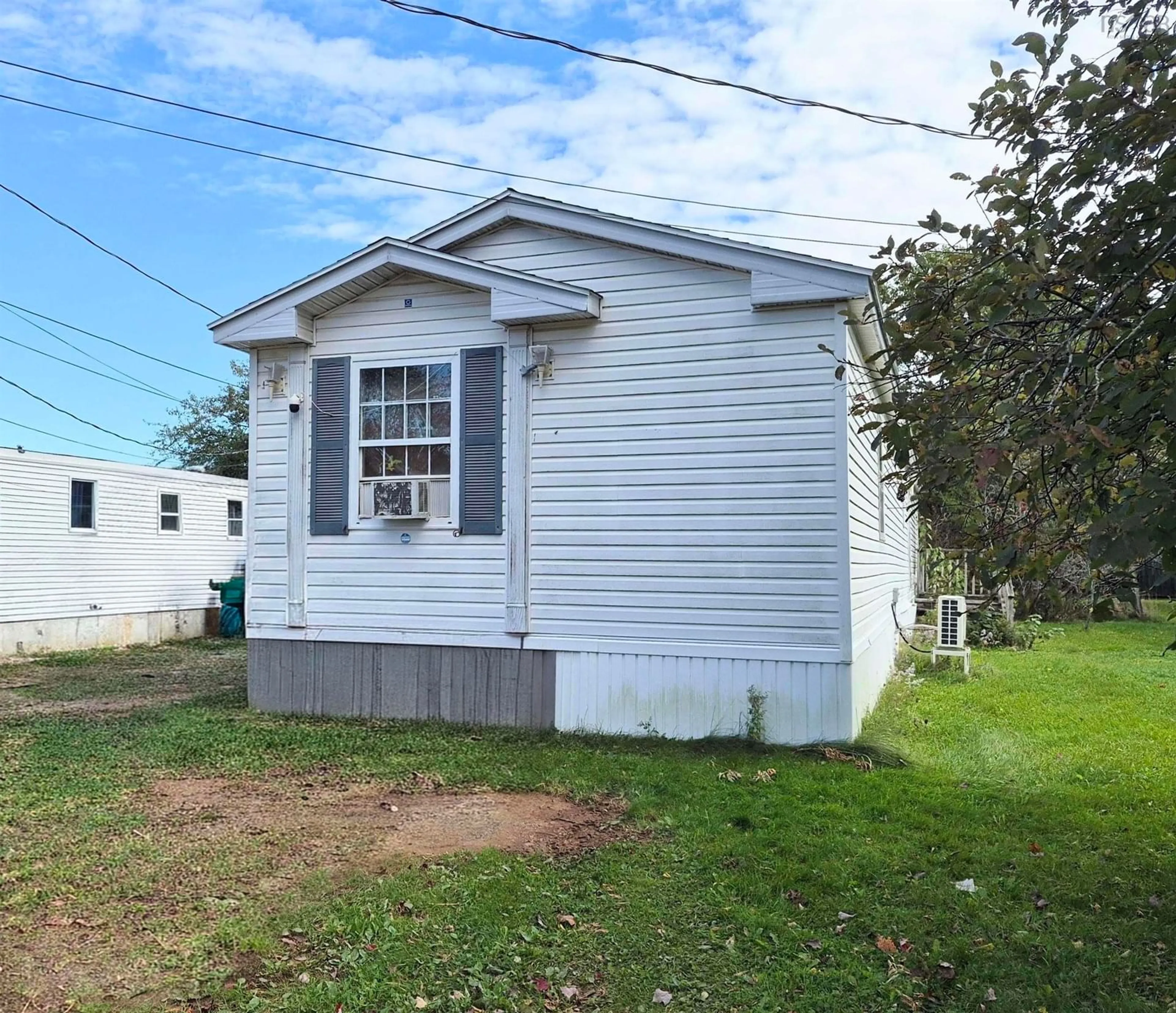 Home with vinyl exterior material, street for 8 Summer St, Murray Siding Nova Scotia B6L 4J8