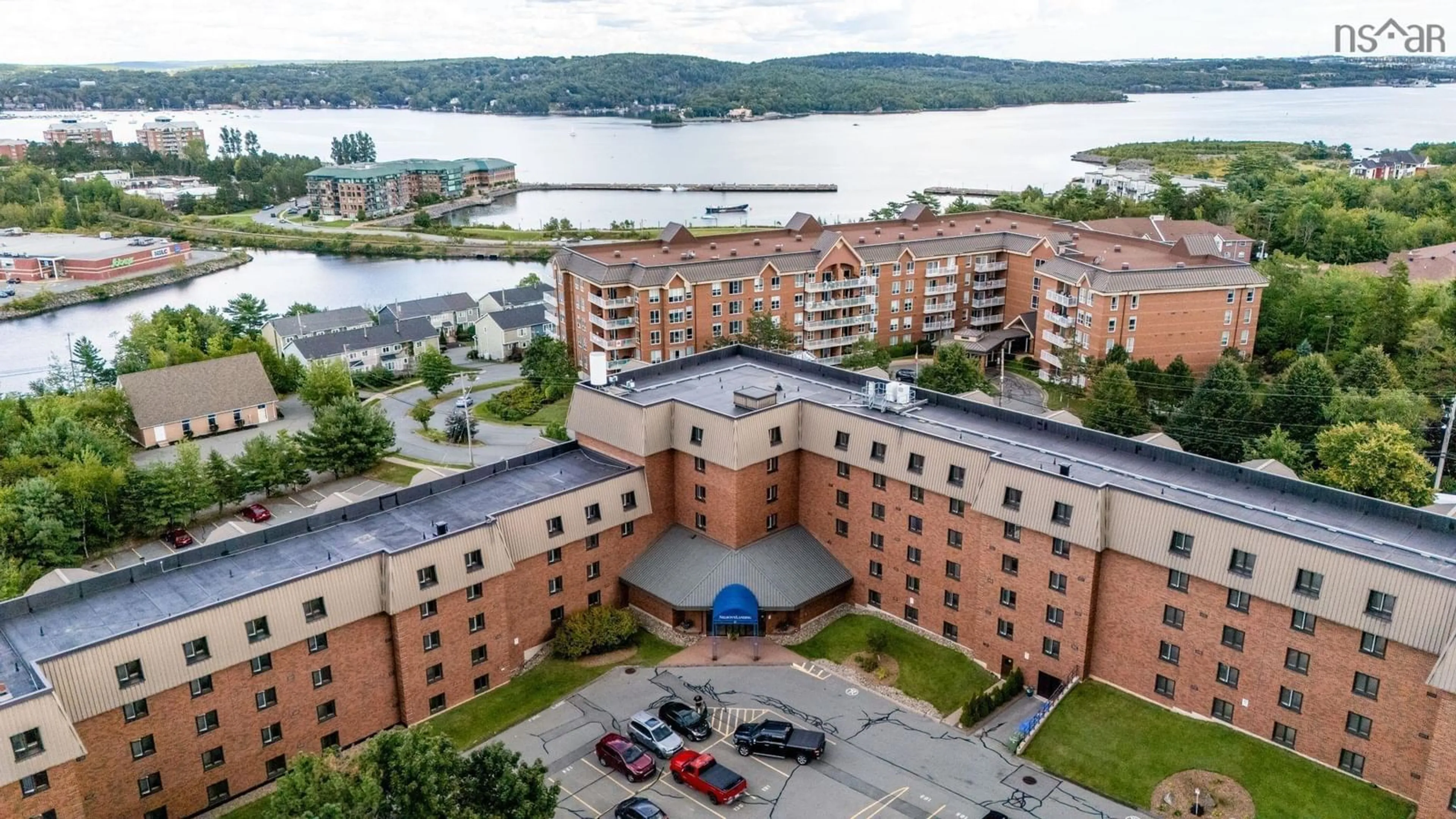 A pic from outside/outdoor area/front of a property/back of a property/a pic from drone, water/lake/river/ocean view for 61 Nelsons Landing Blvd #205, Bedford Nova Scotia B4A 3X3