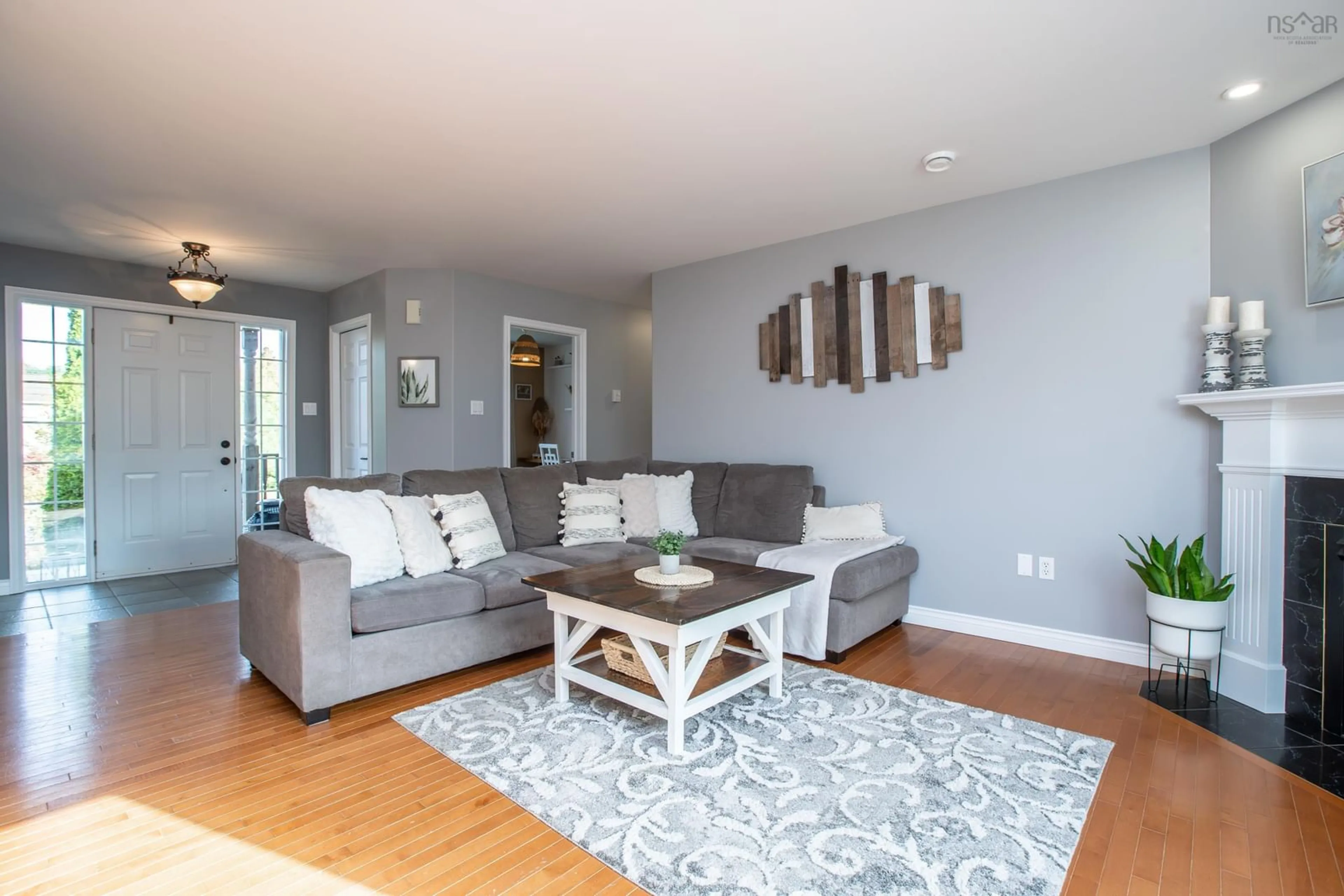 Living room with furniture, wood/laminate floor for 397 Rochester Dr, Hammonds Plains Nova Scotia B4B 1V7