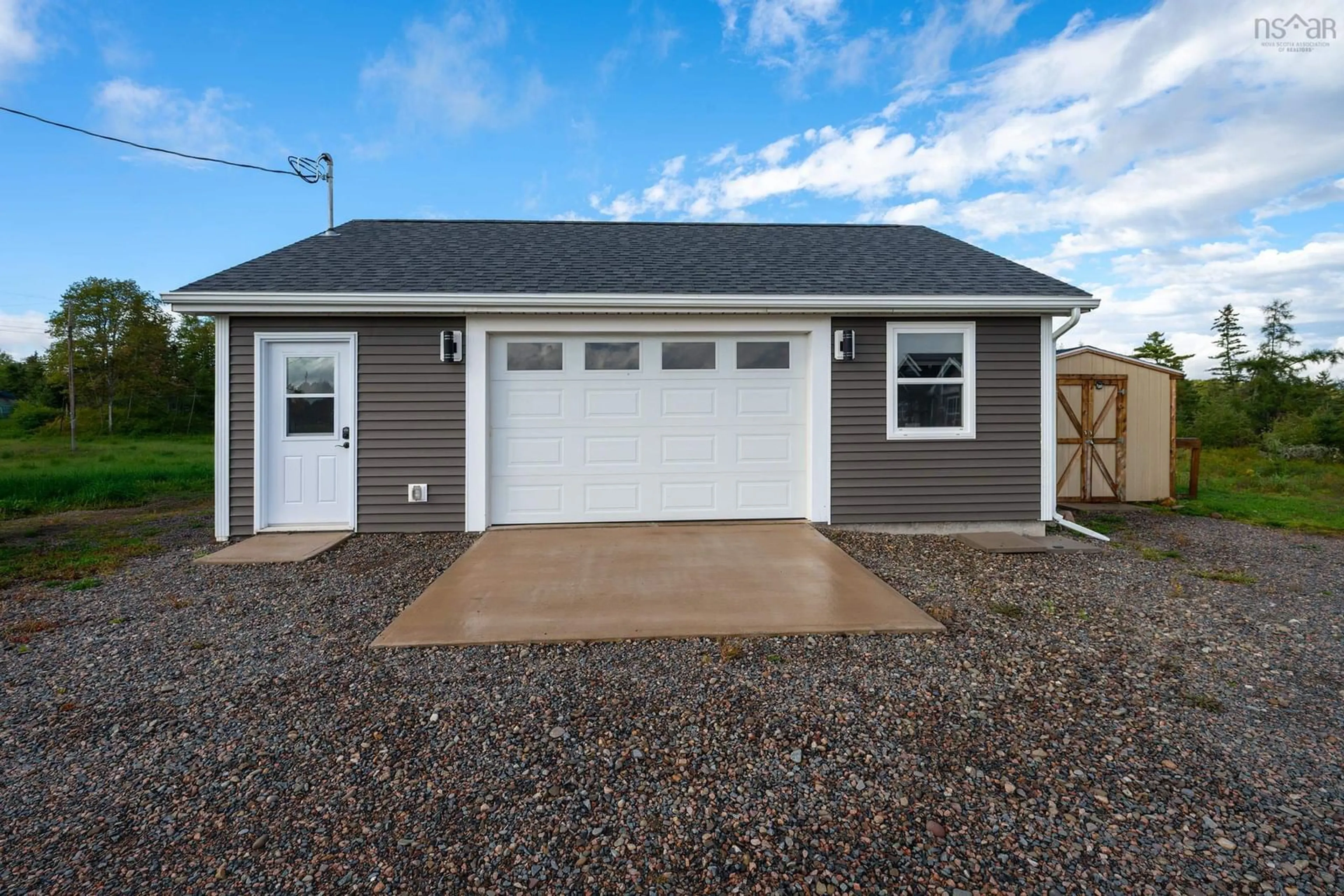 Home with vinyl exterior material, street for 48 Festival Lane, MacKay Siding Nova Scotia B0N 2J0