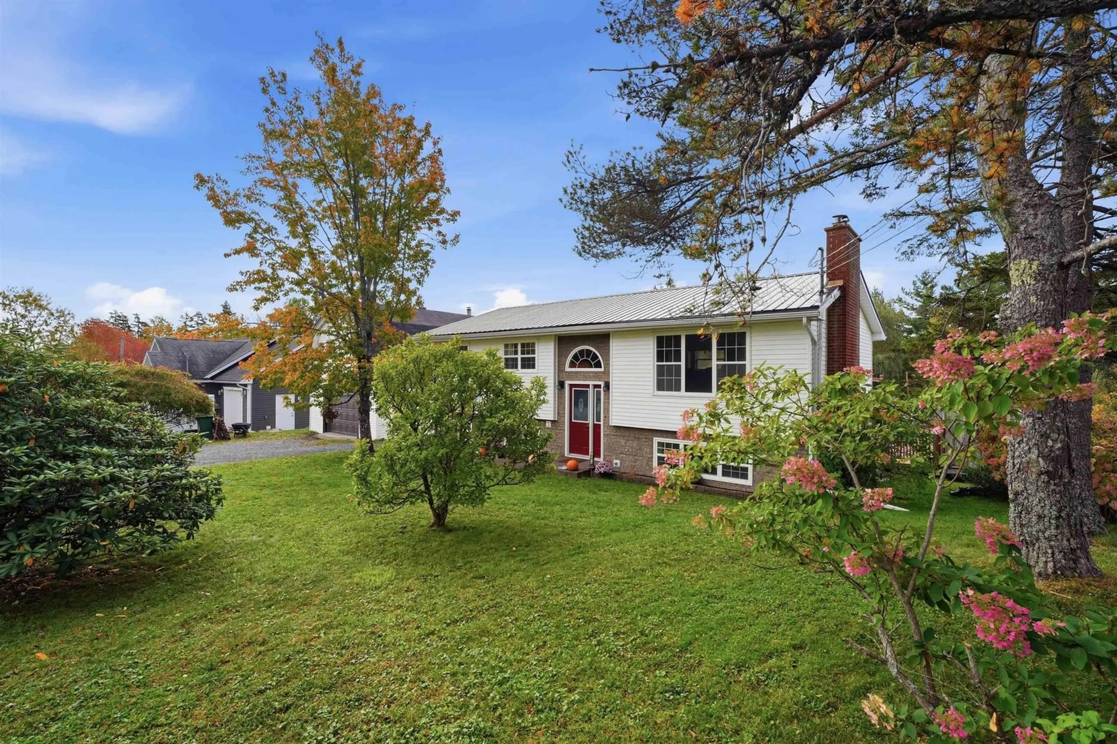 A pic from outside/outdoor area/front of a property/back of a property/a pic from drone, street for 49 Mayflower Ave, Beaver Bank Nova Scotia B4G 1C1