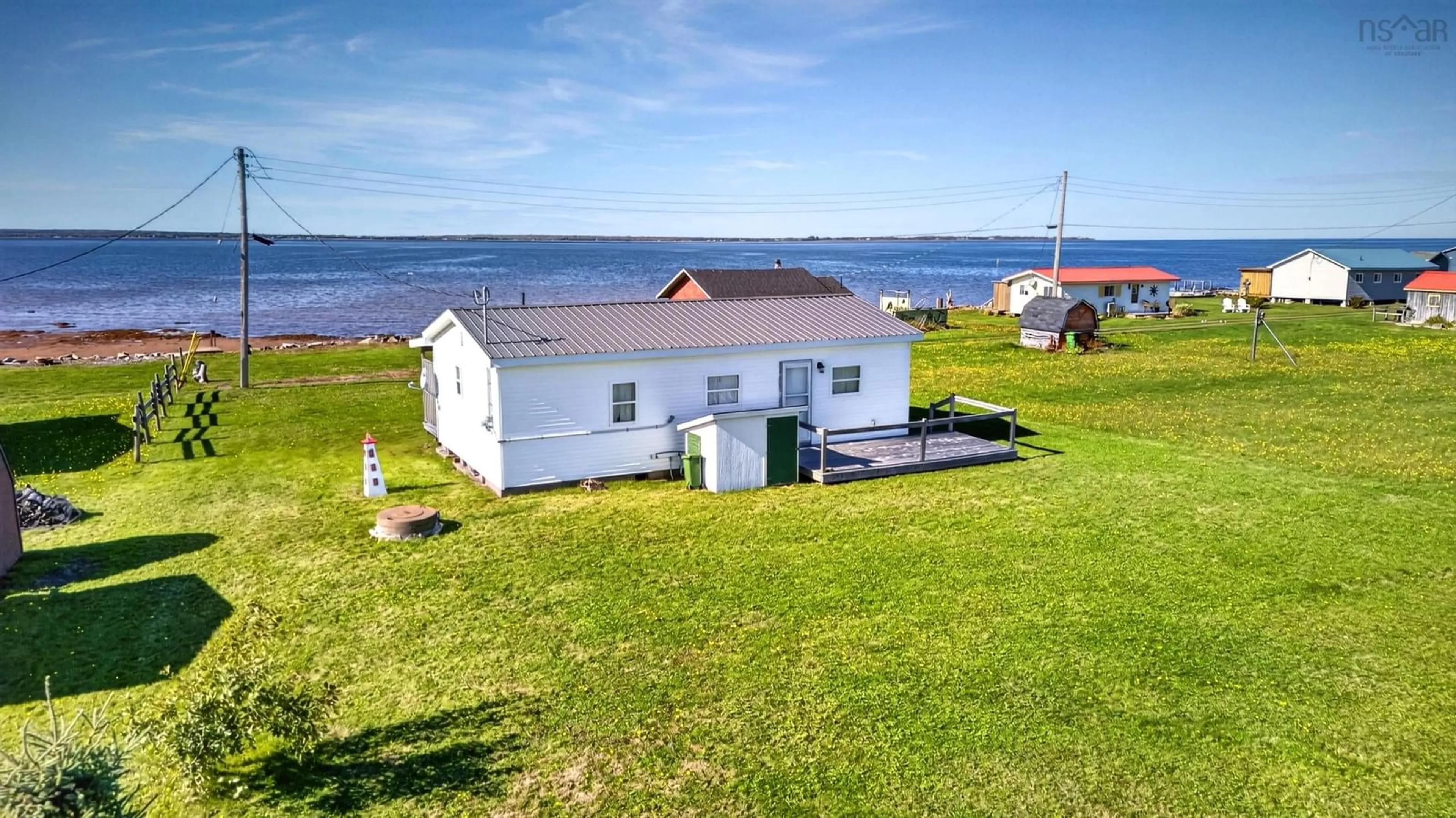 A pic from outside/outdoor area/front of a property/back of a property/a pic from drone, water/lake/river/ocean view for 31 Quahog Lane, Brule Point Nova Scotia B0K 1V0